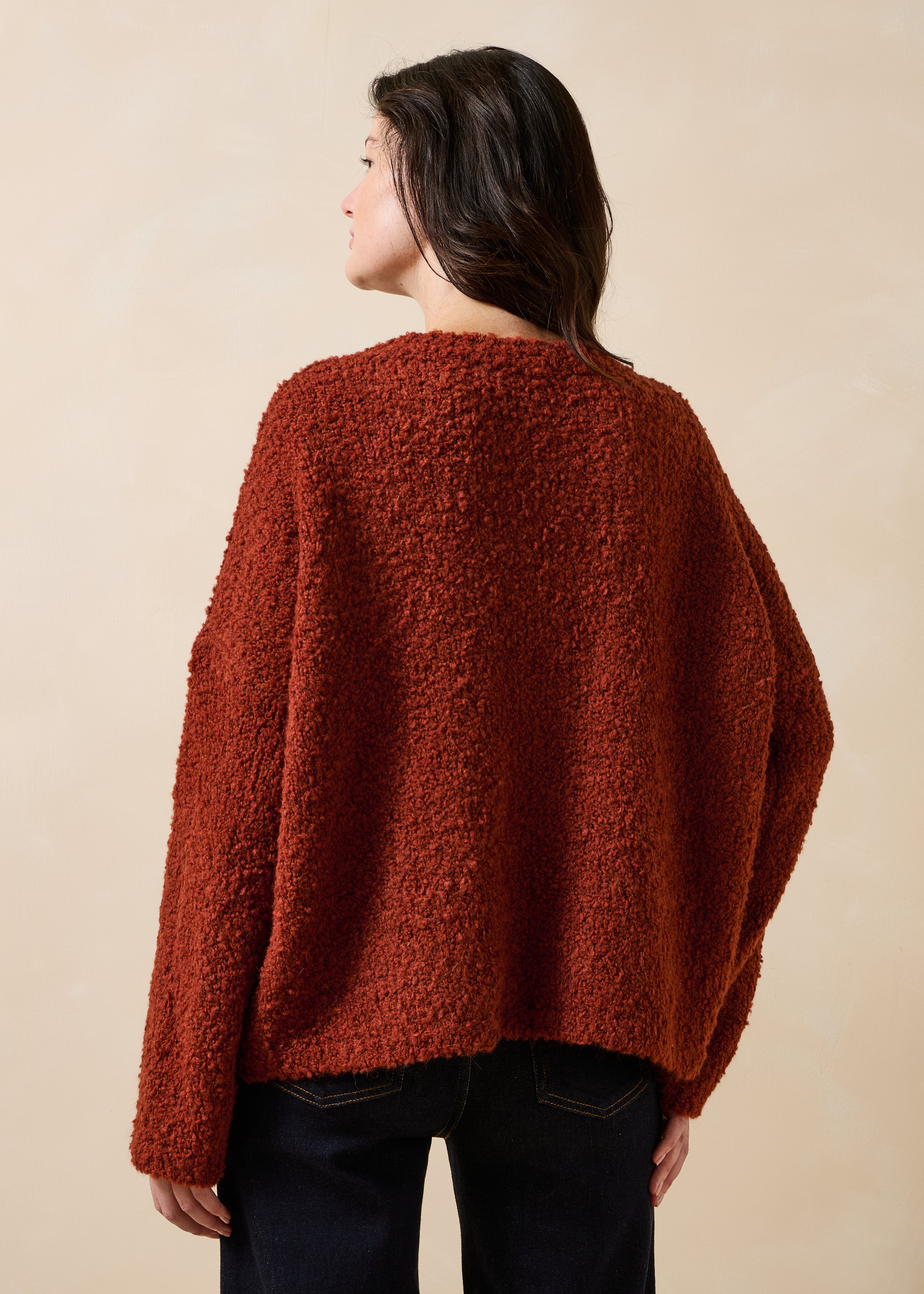 Rust boucle knit long sleeve round neck sweater