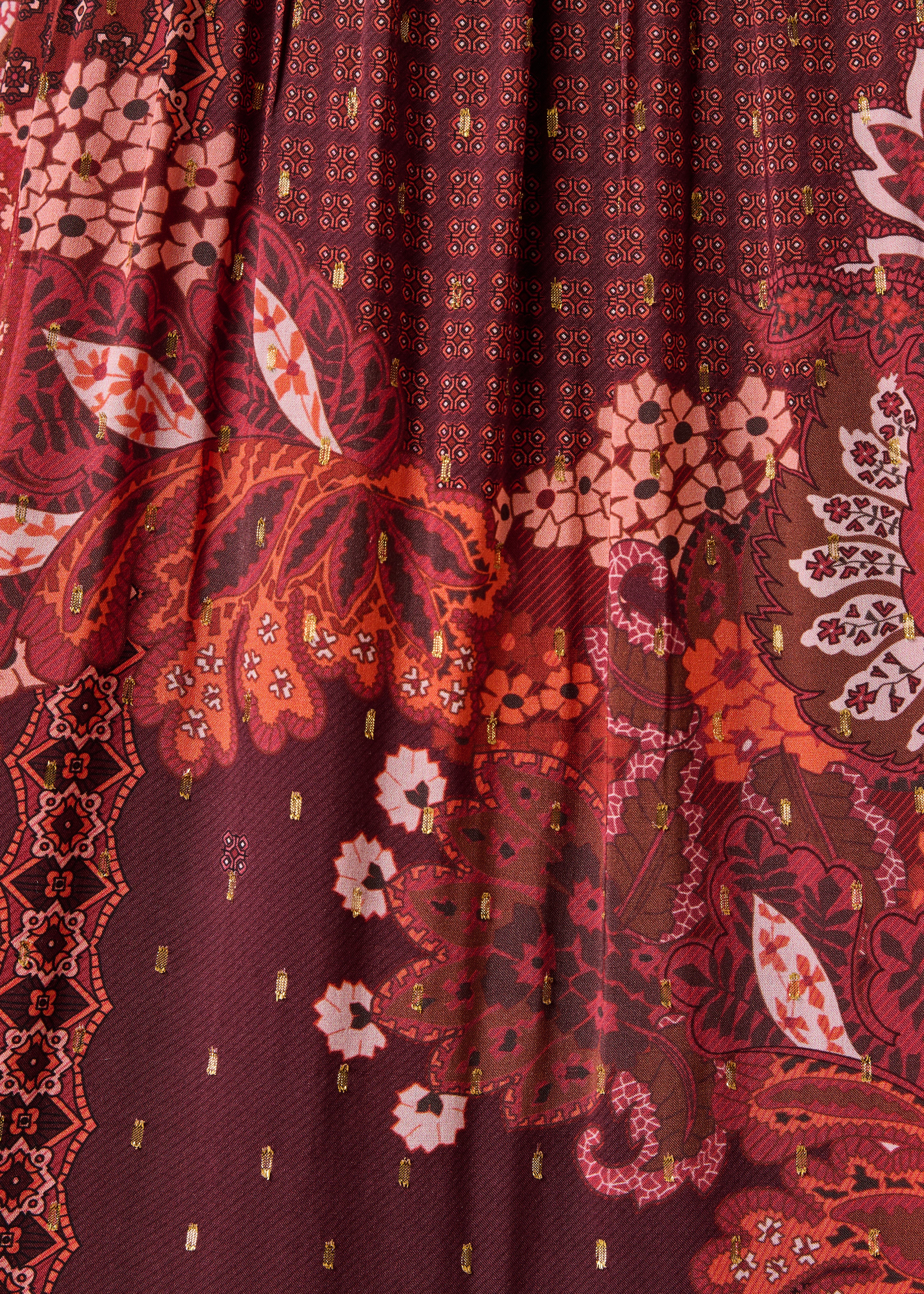 Long red printed dress with long sleeves and Tunisian collar
