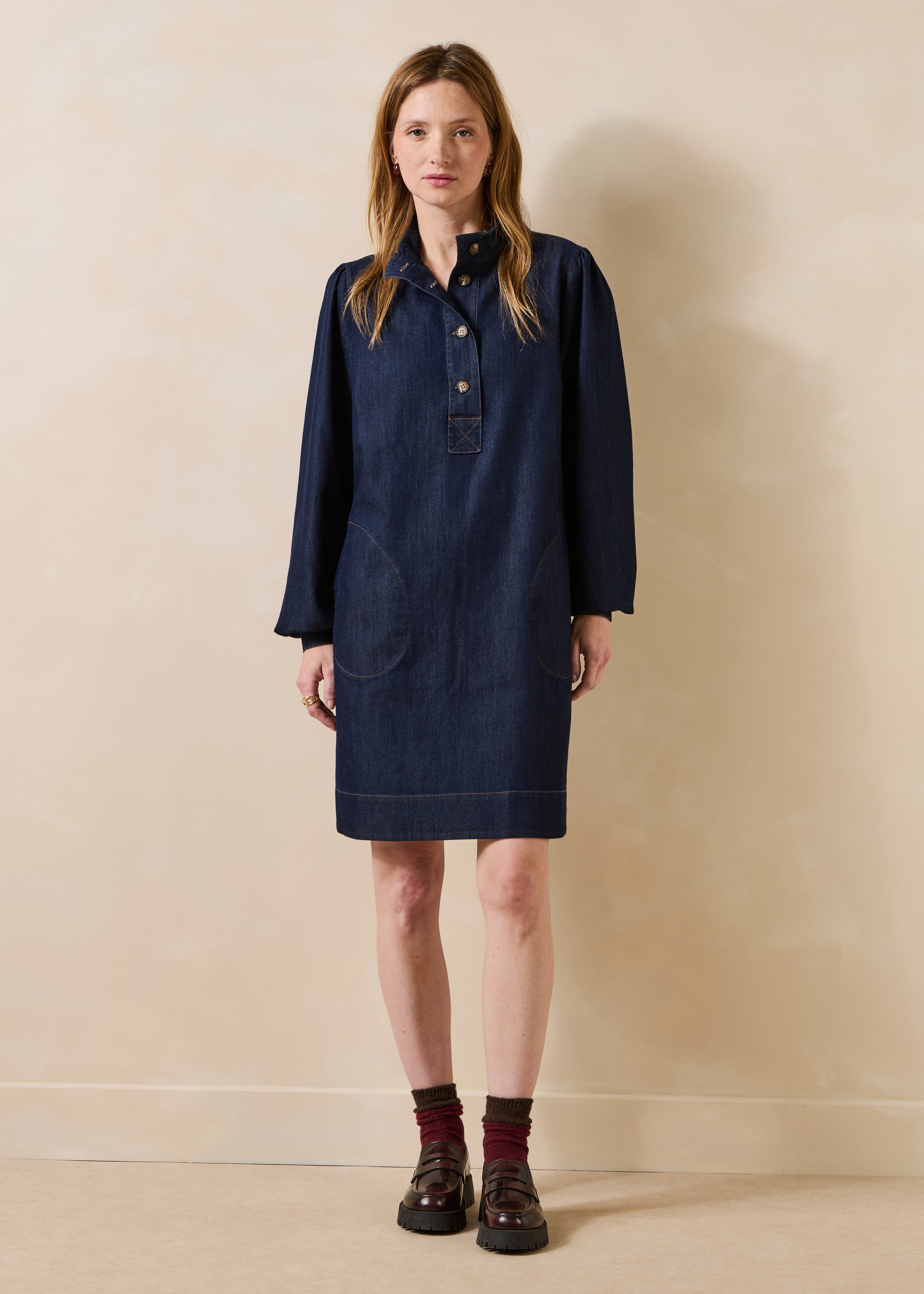 Raw denim short dress with long sleeves and a high collar