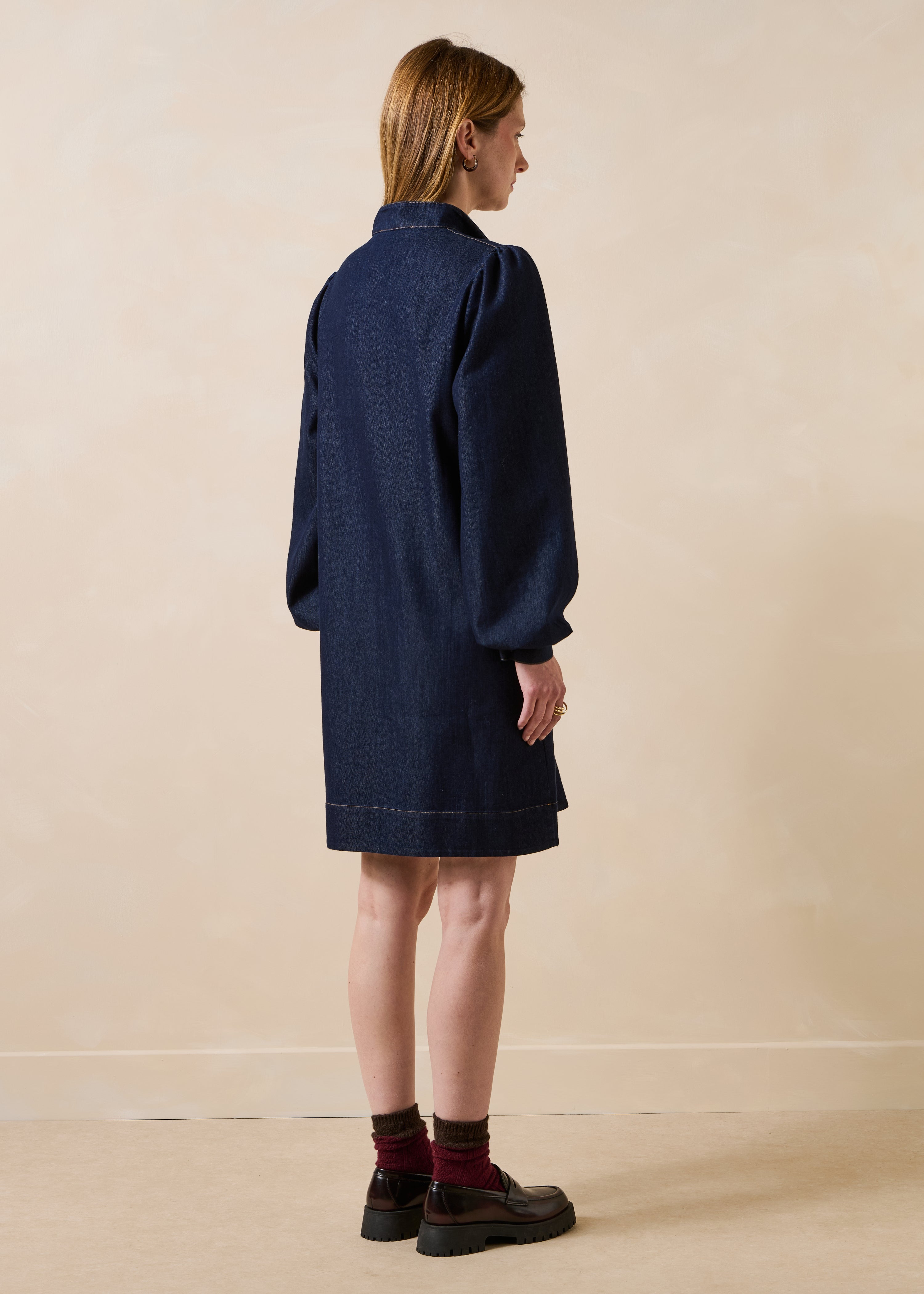 Raw denim short dress with long sleeves and a high collar