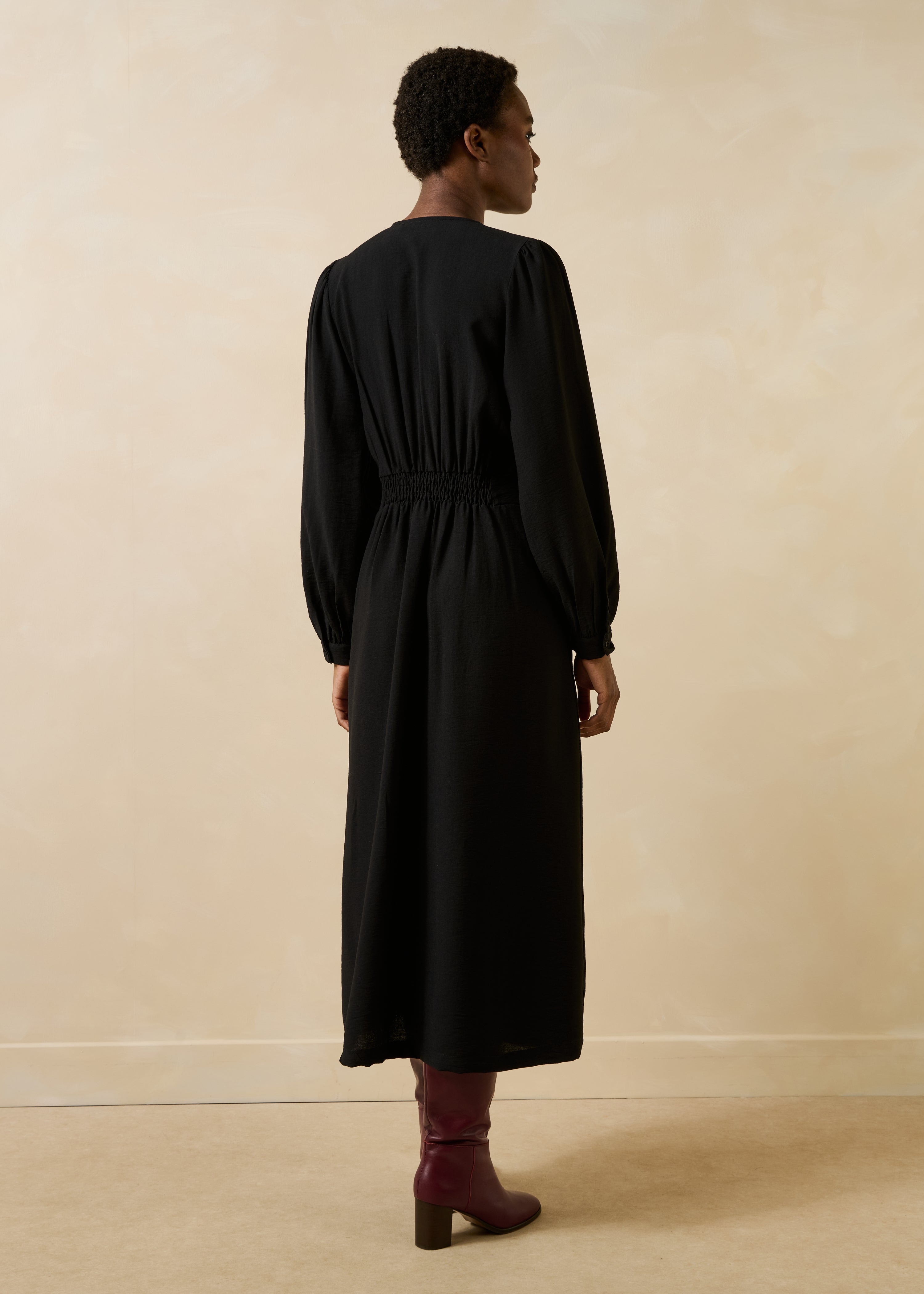 Black fitted long wrap dress