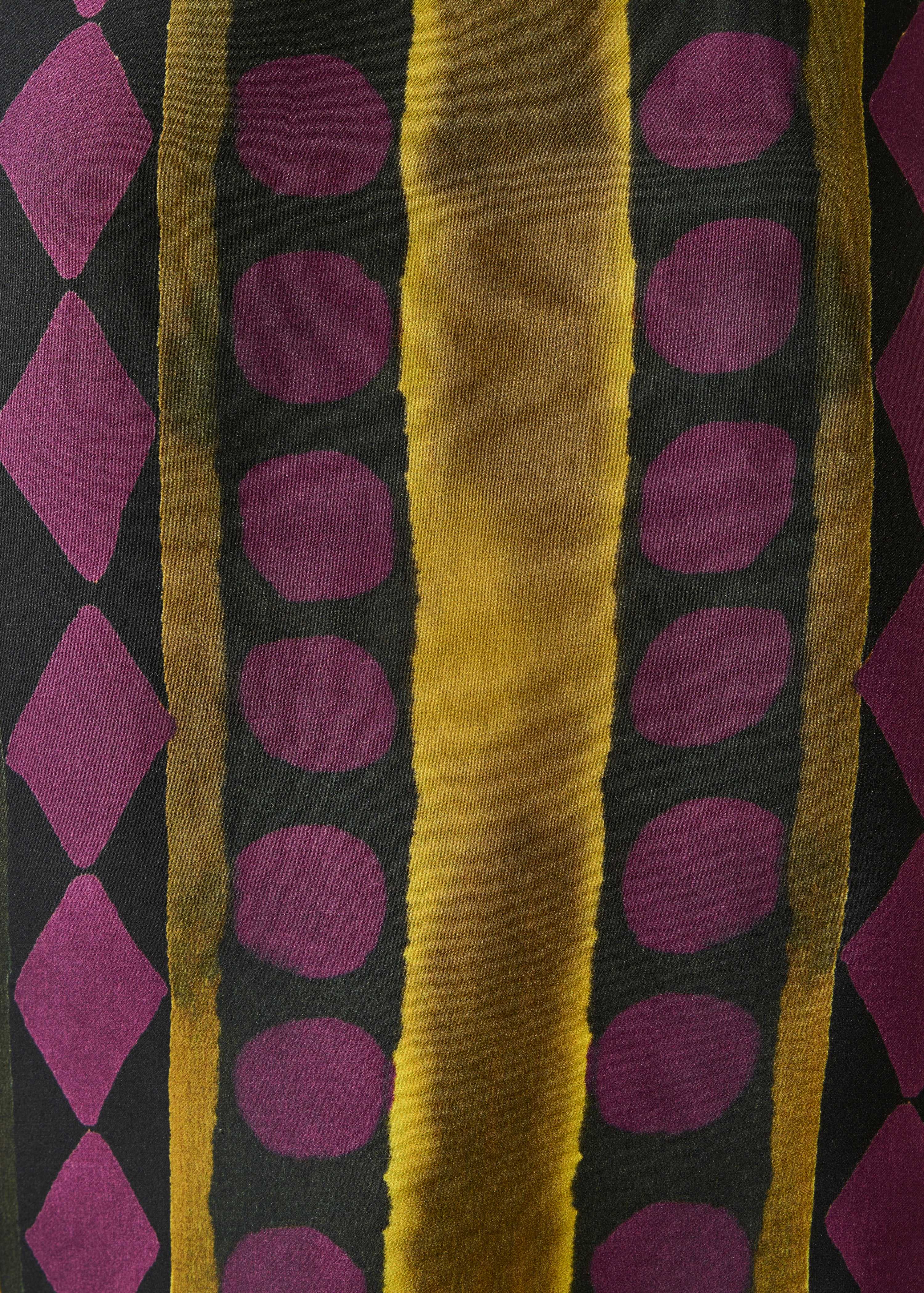 Loose black and ochre fluid top with long printed sleeves