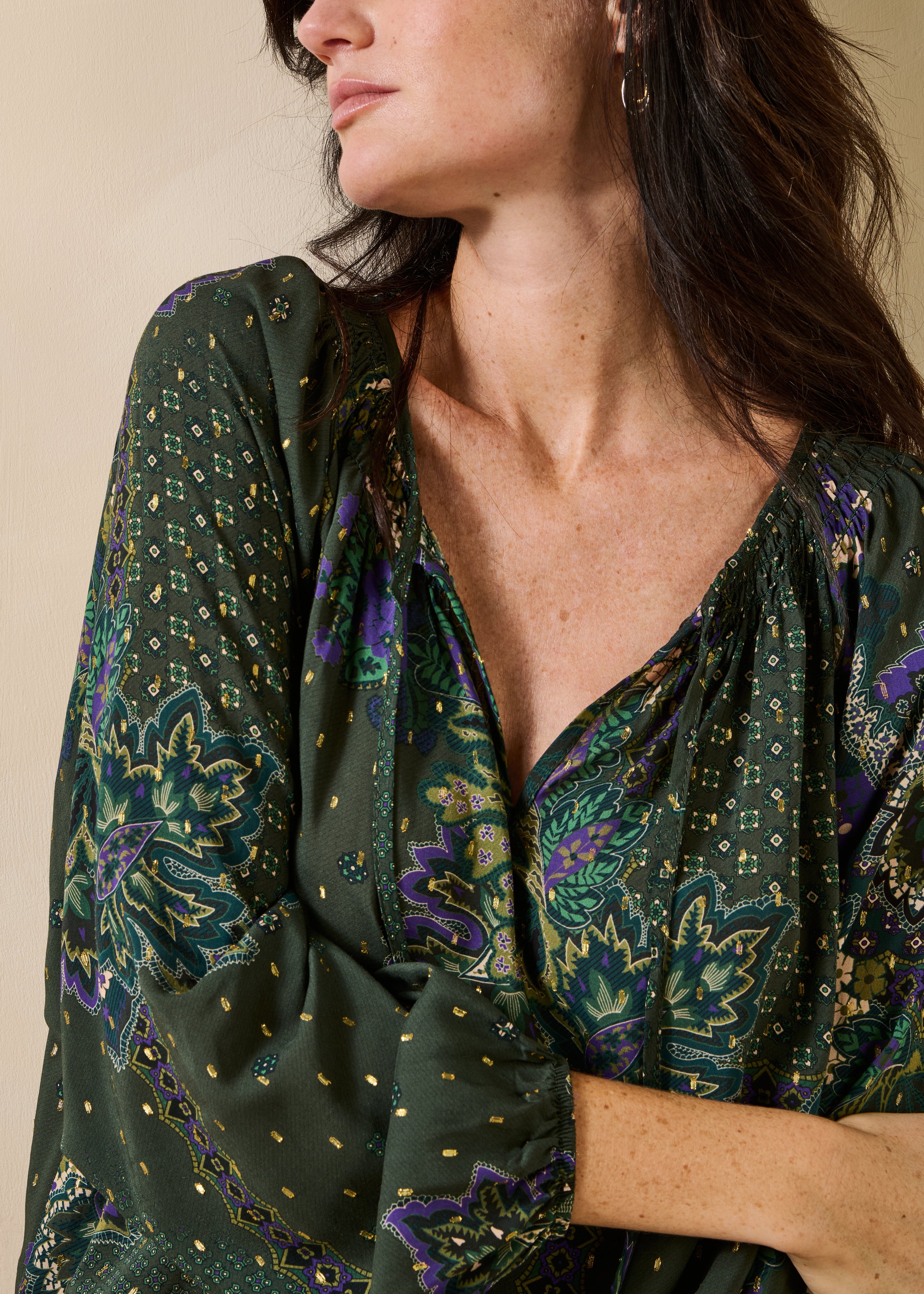 Loose green top with print