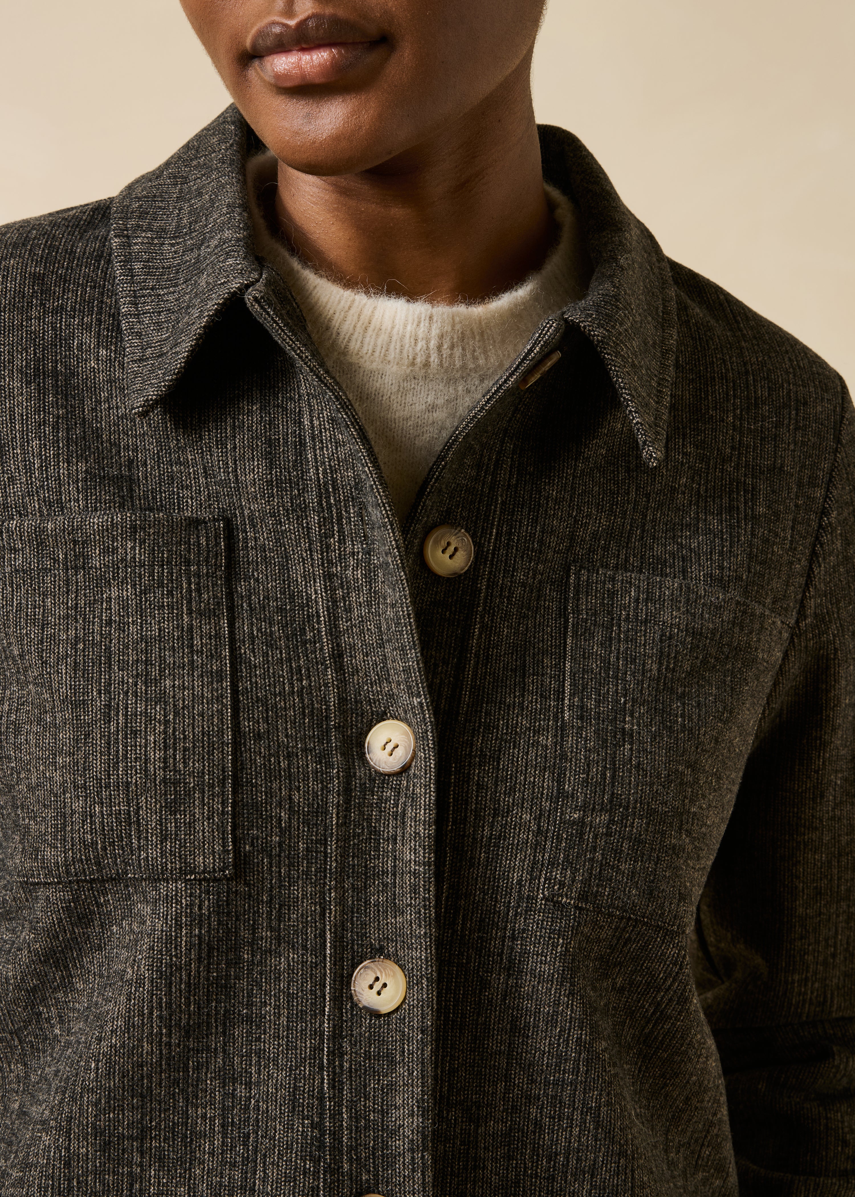 Short brown milano jacket with long sleeves