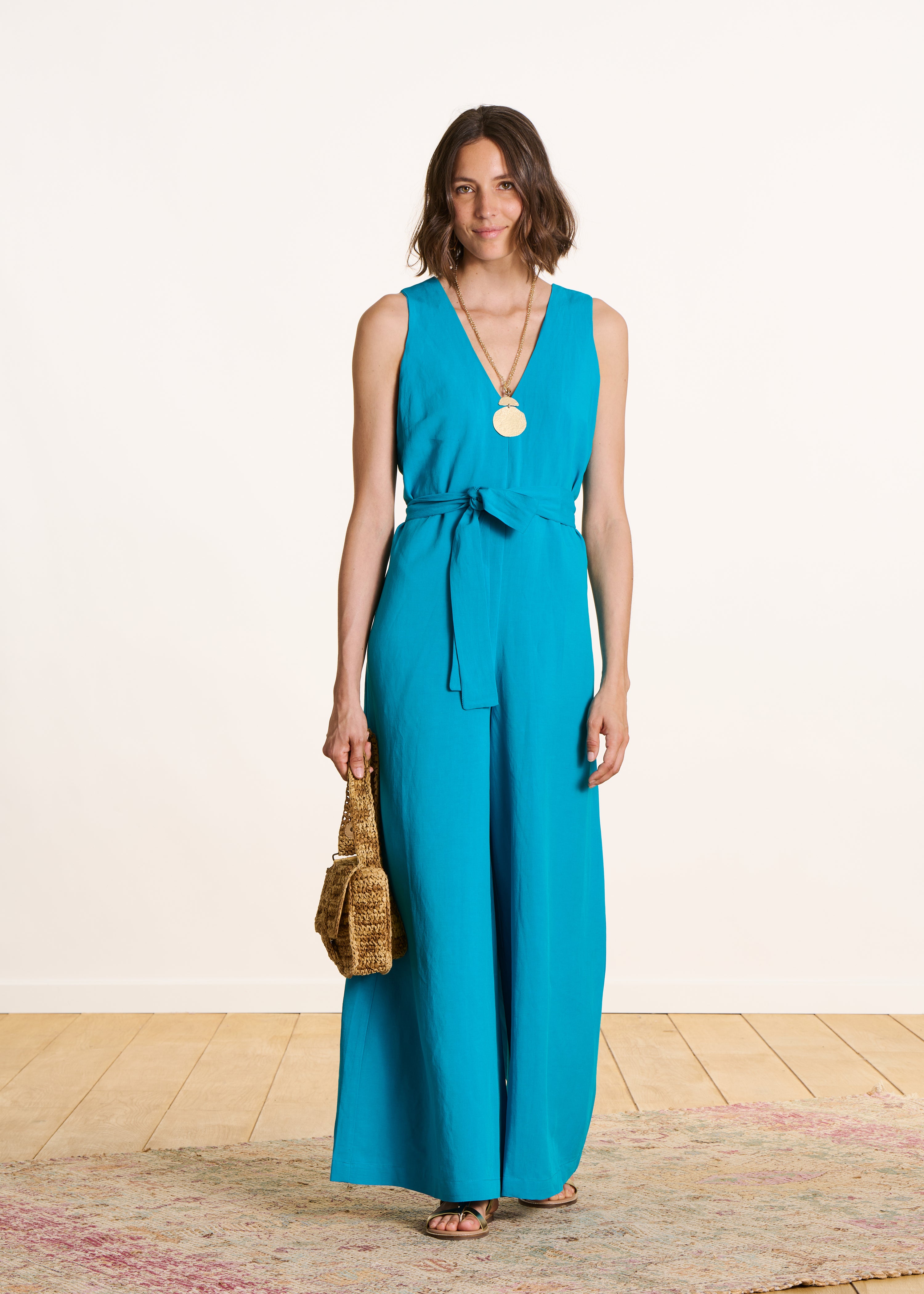 Combinaison pantalon sans manches bleu turquoise