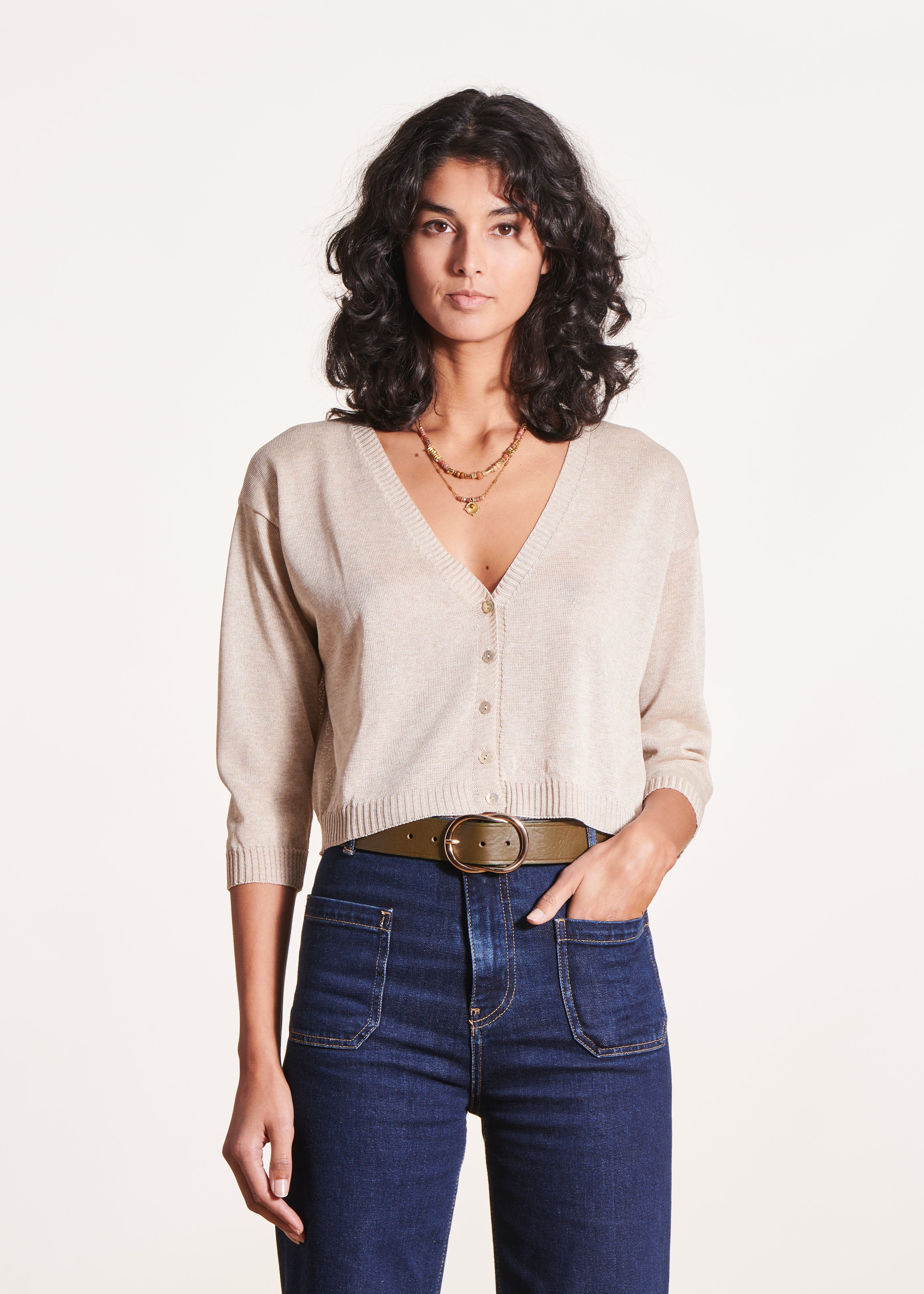 Kort beige vest, lange mouwen, V-hals