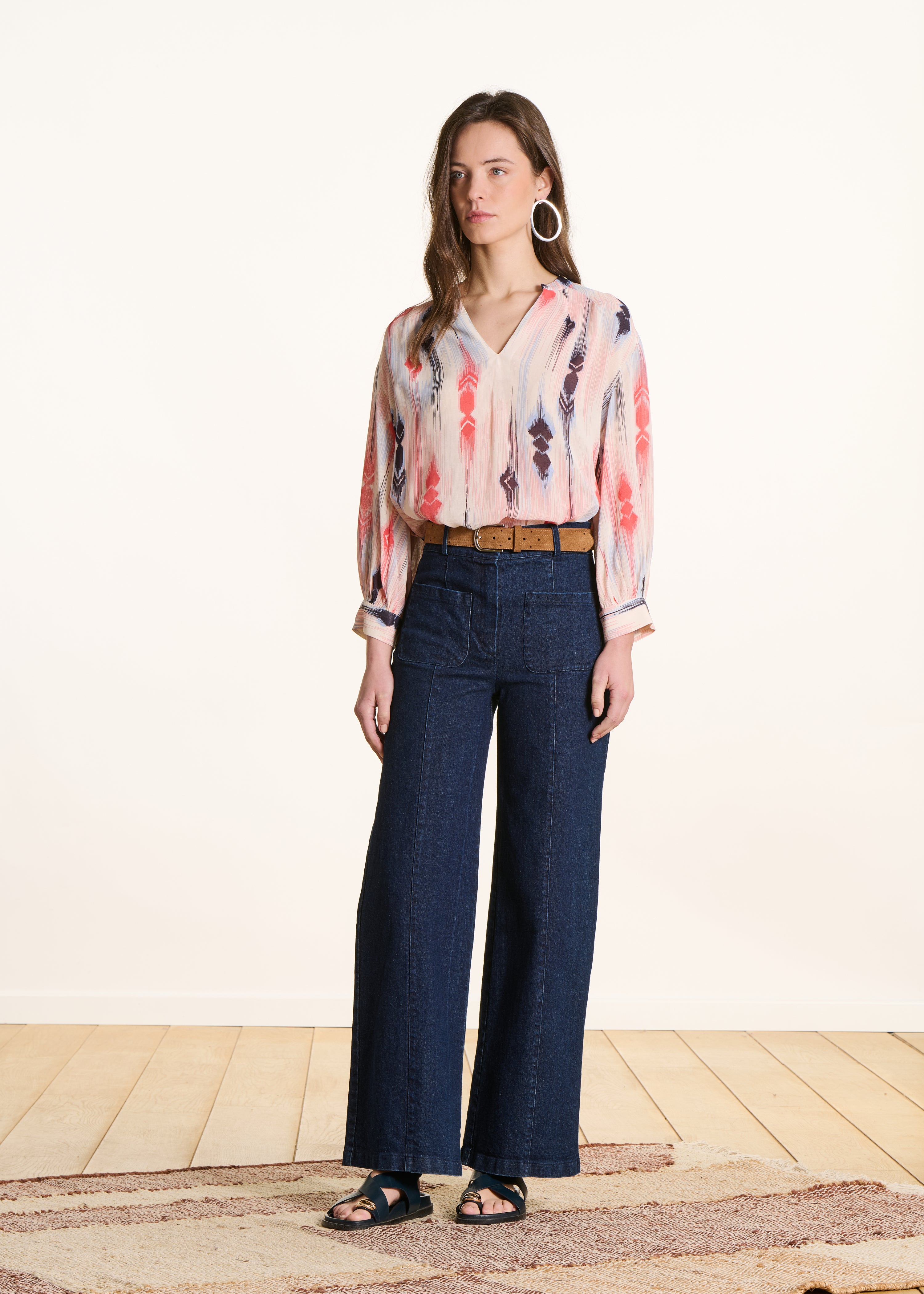 High-waisted raw wide-leg jeans