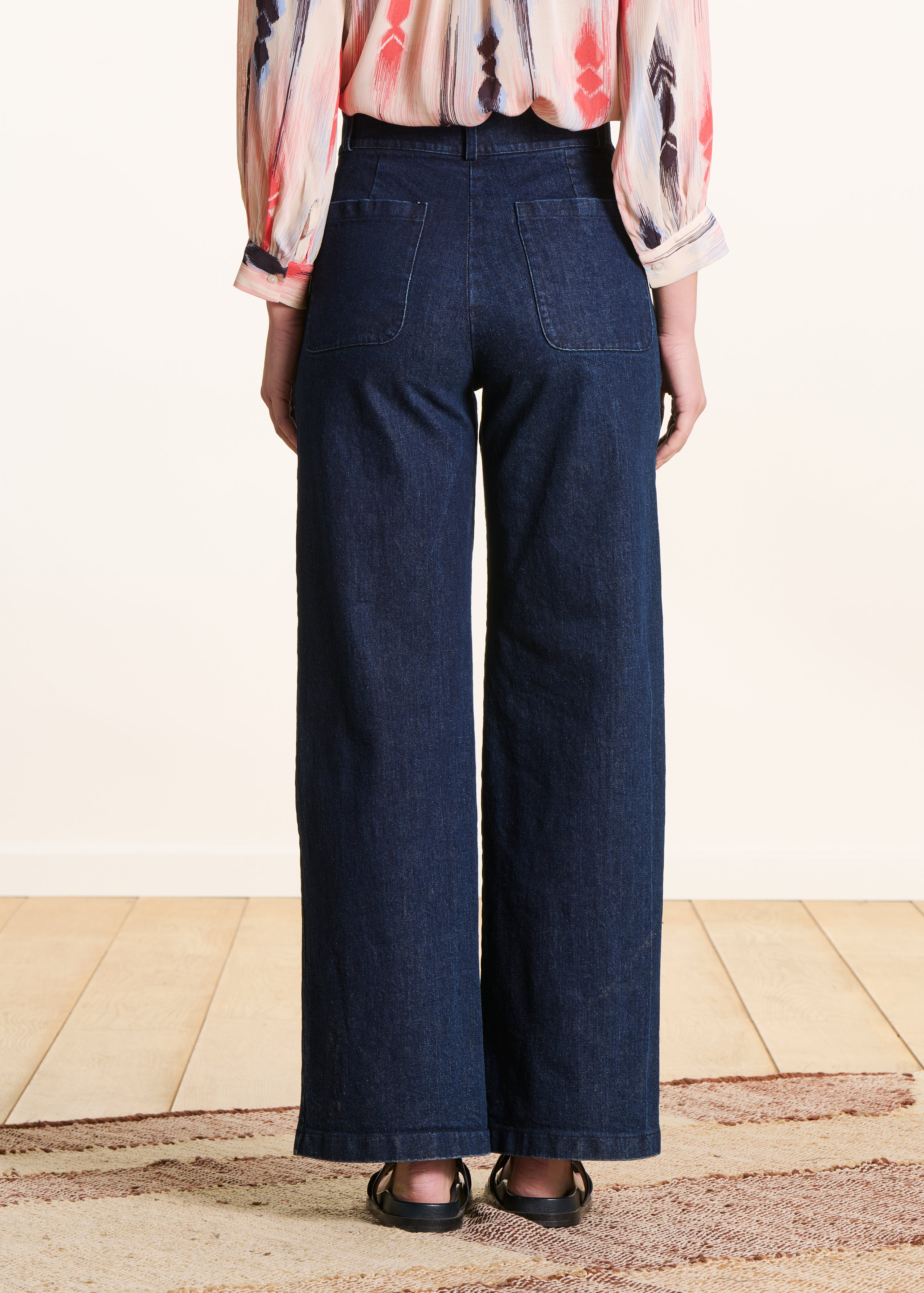 High-waisted raw wide-leg jeans