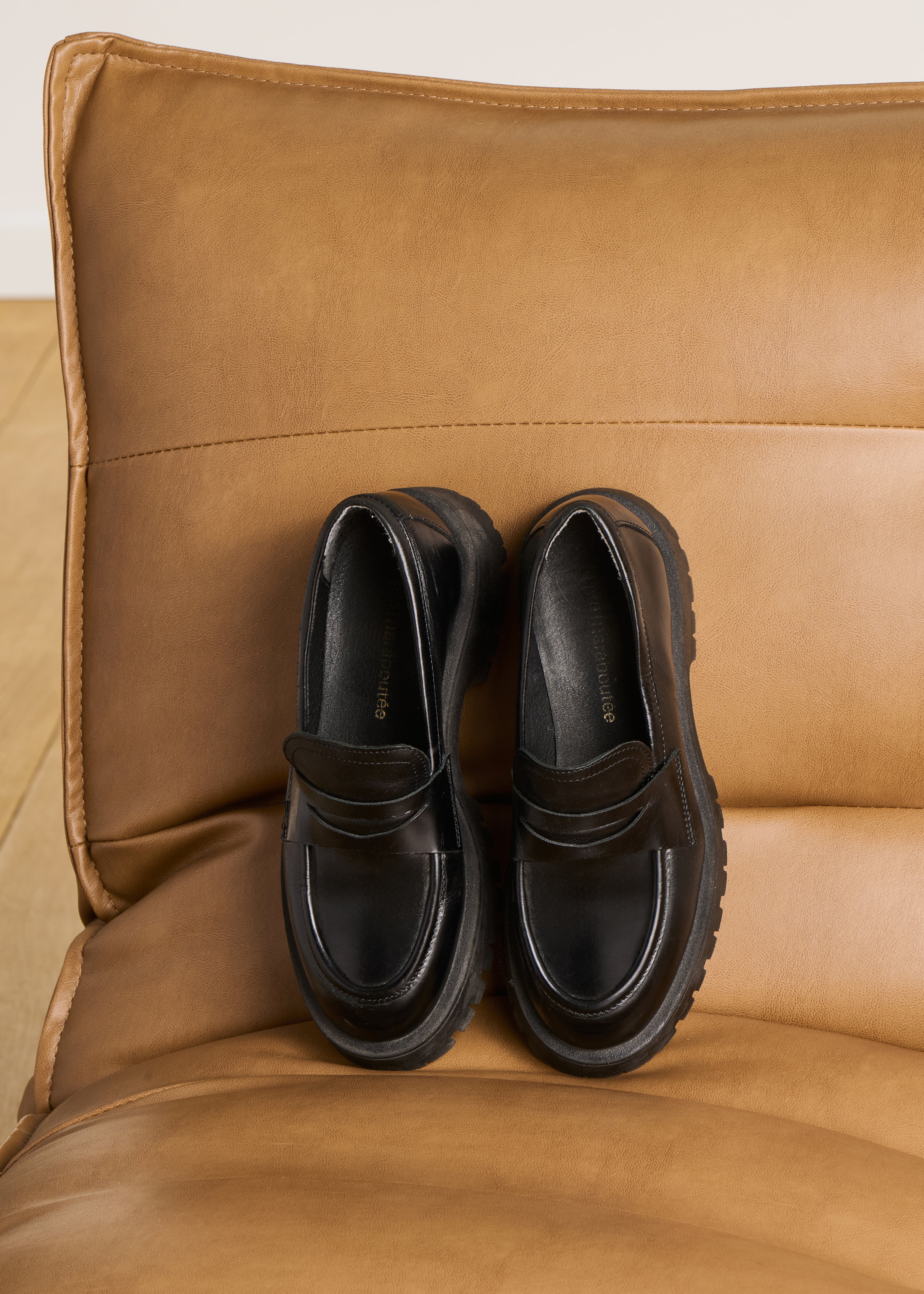 Black leather moccasins