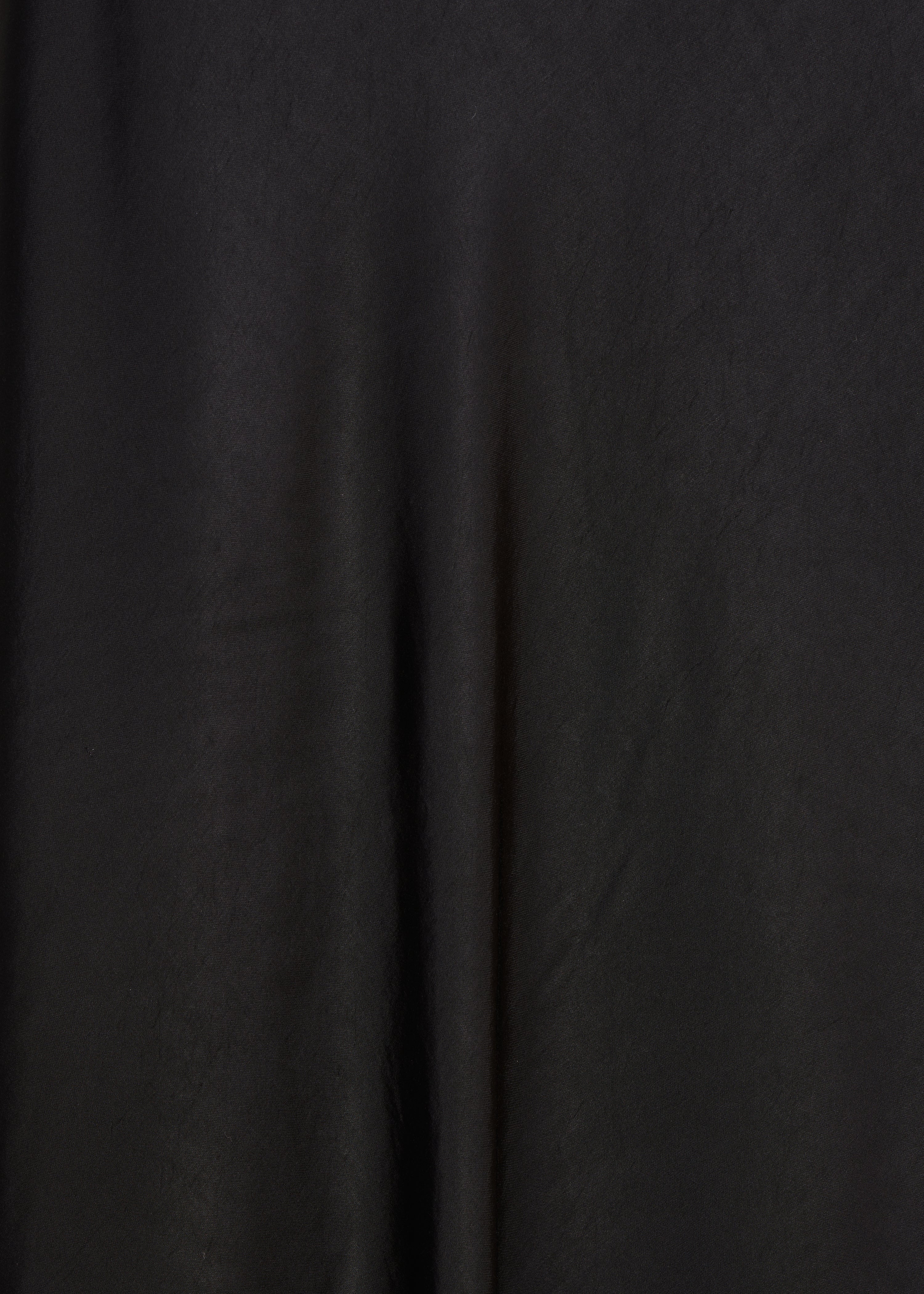 Jupe longue fluide noire en satin