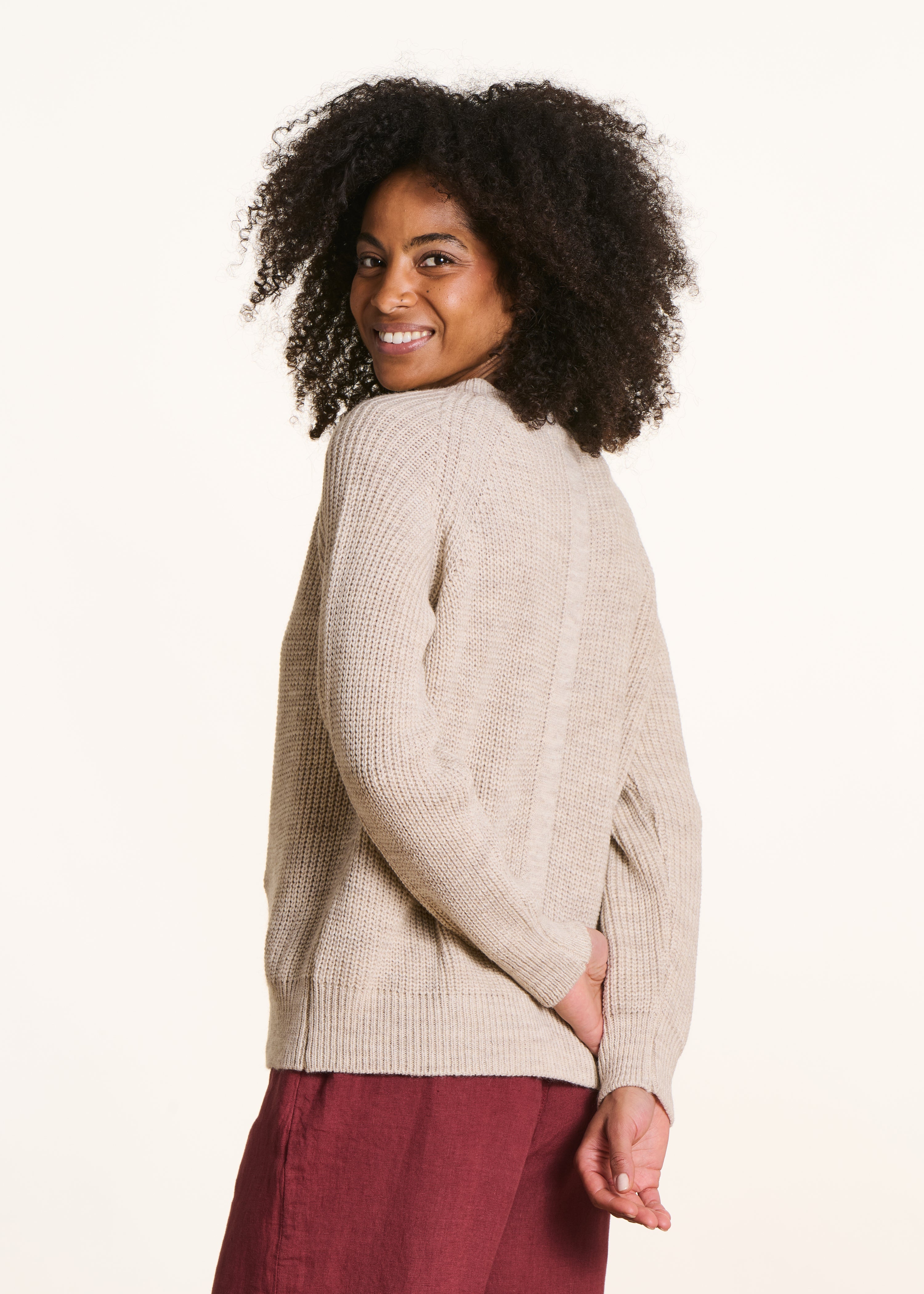 Beige V-neck sweater in beaded rib knit