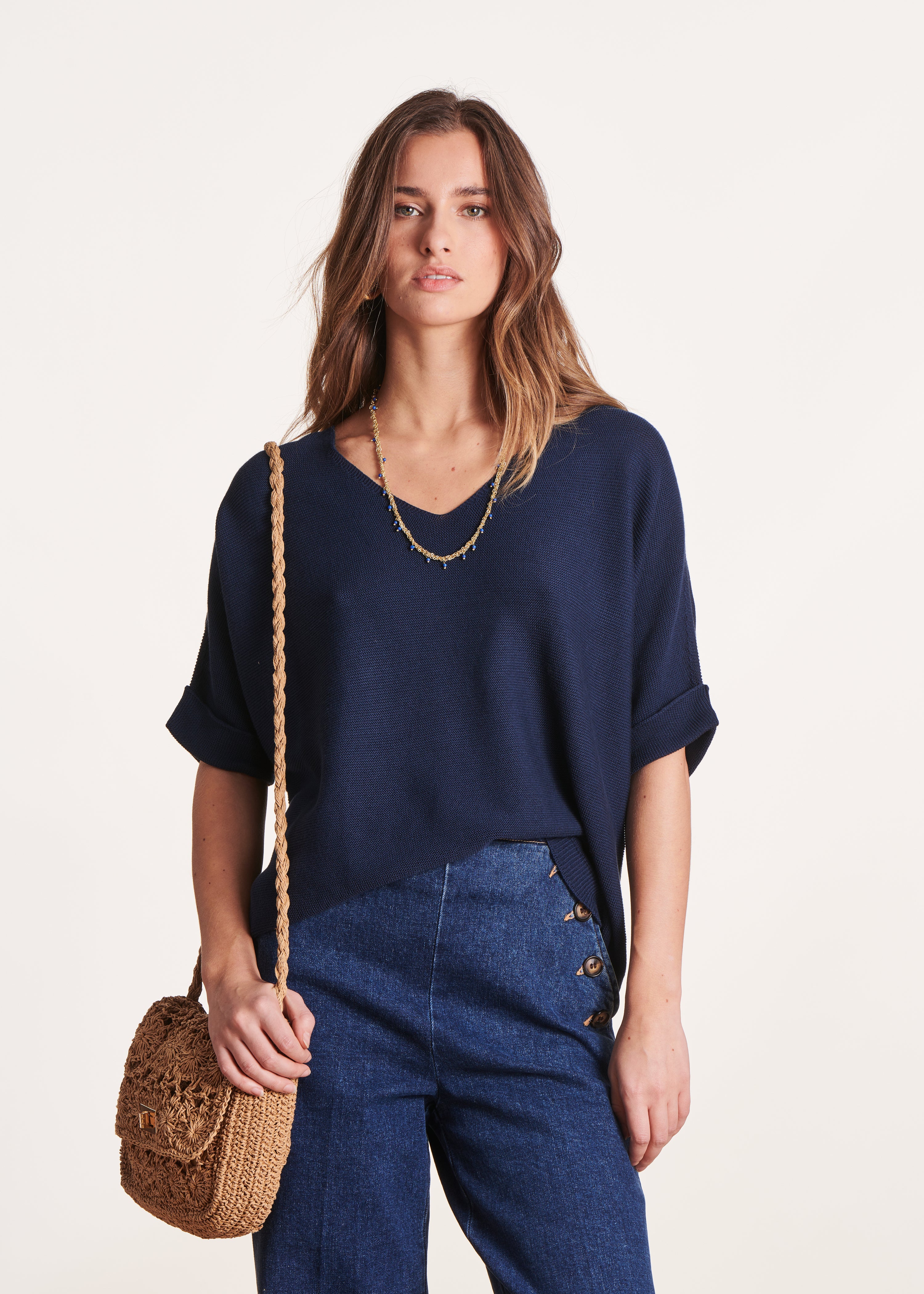 Navy blue short-sleeved V-neck sweater