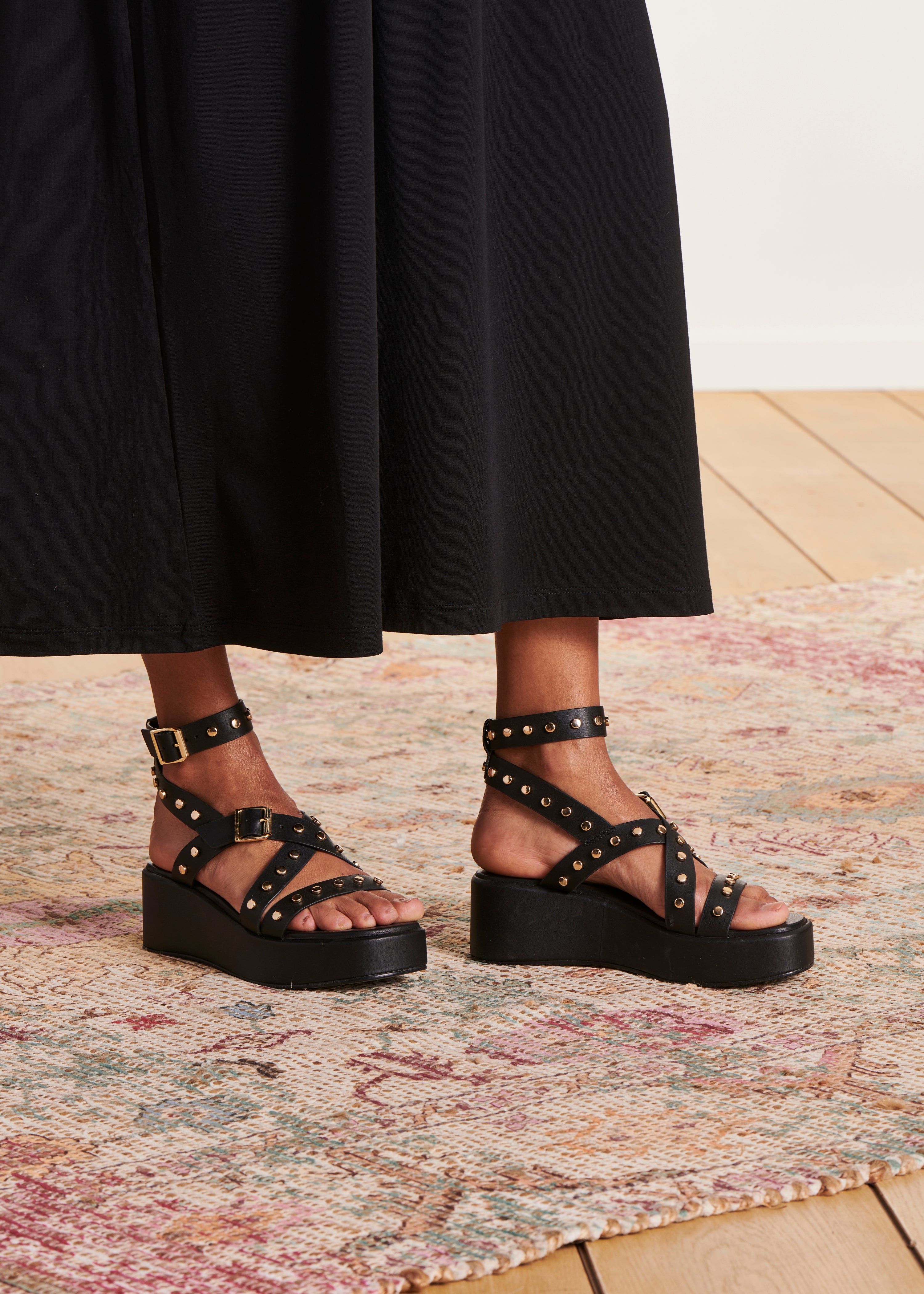 Black studded leather platform sandals