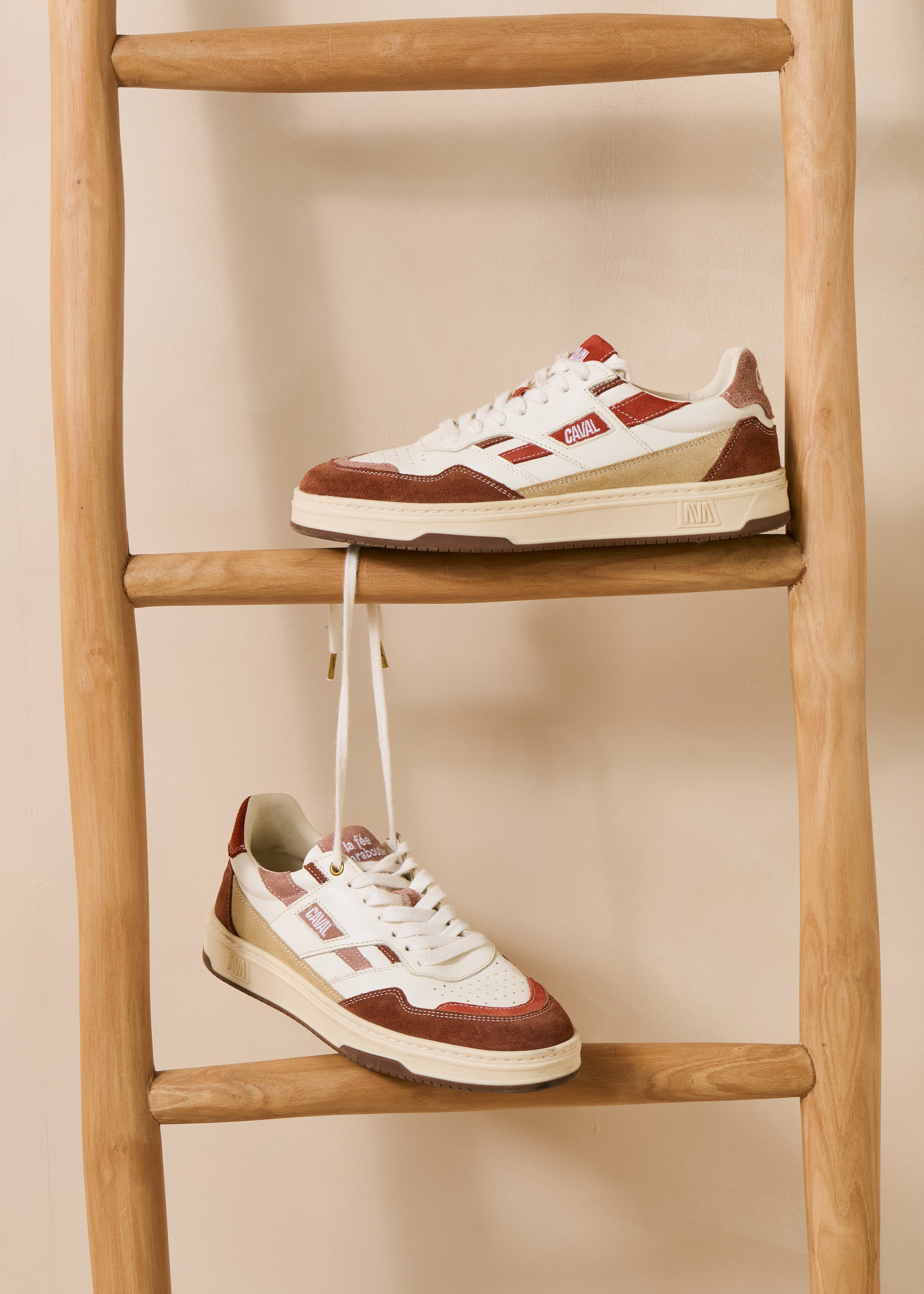 Red asymmetrical leather sneakers