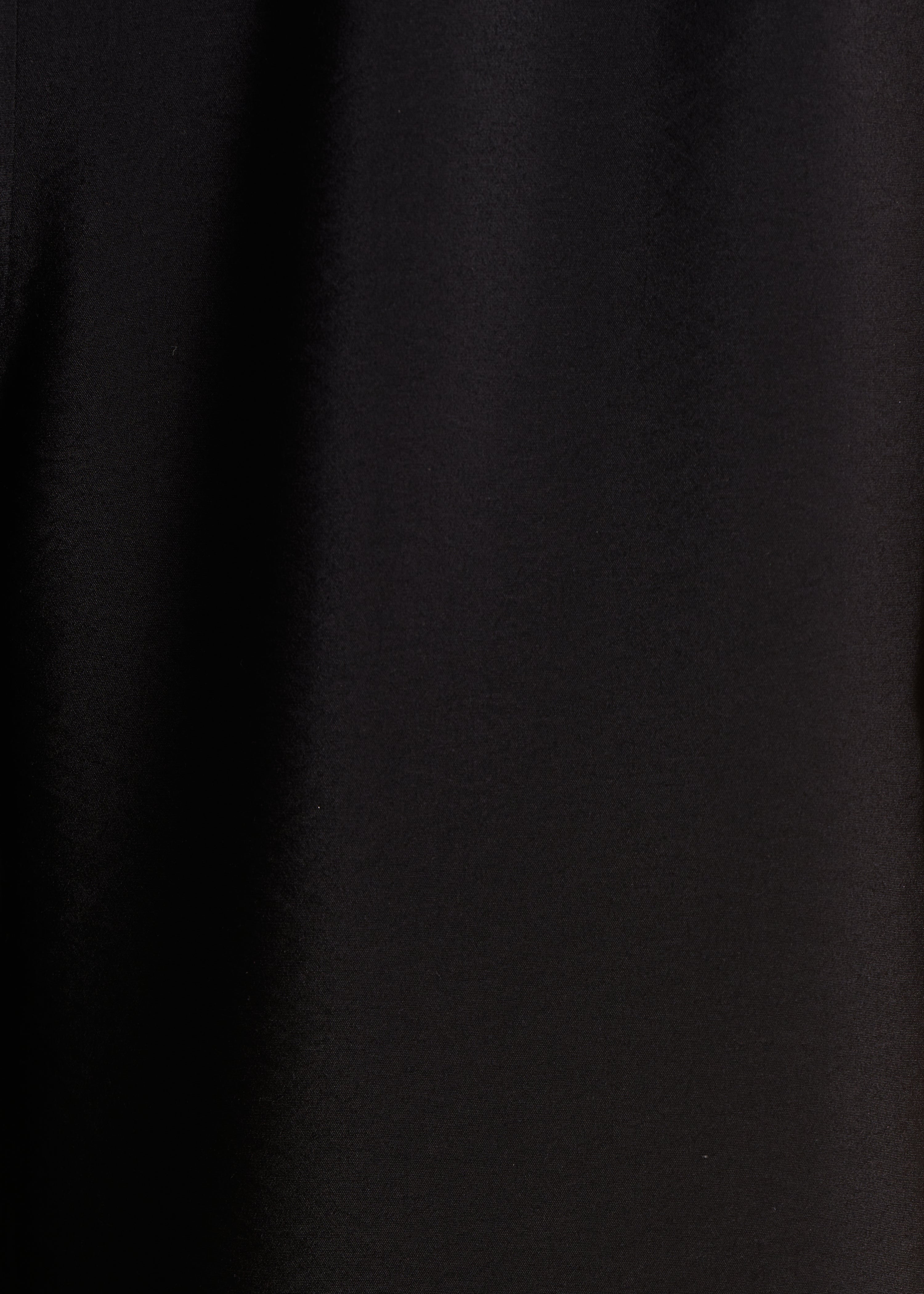 Combinaison pantalon noire unie