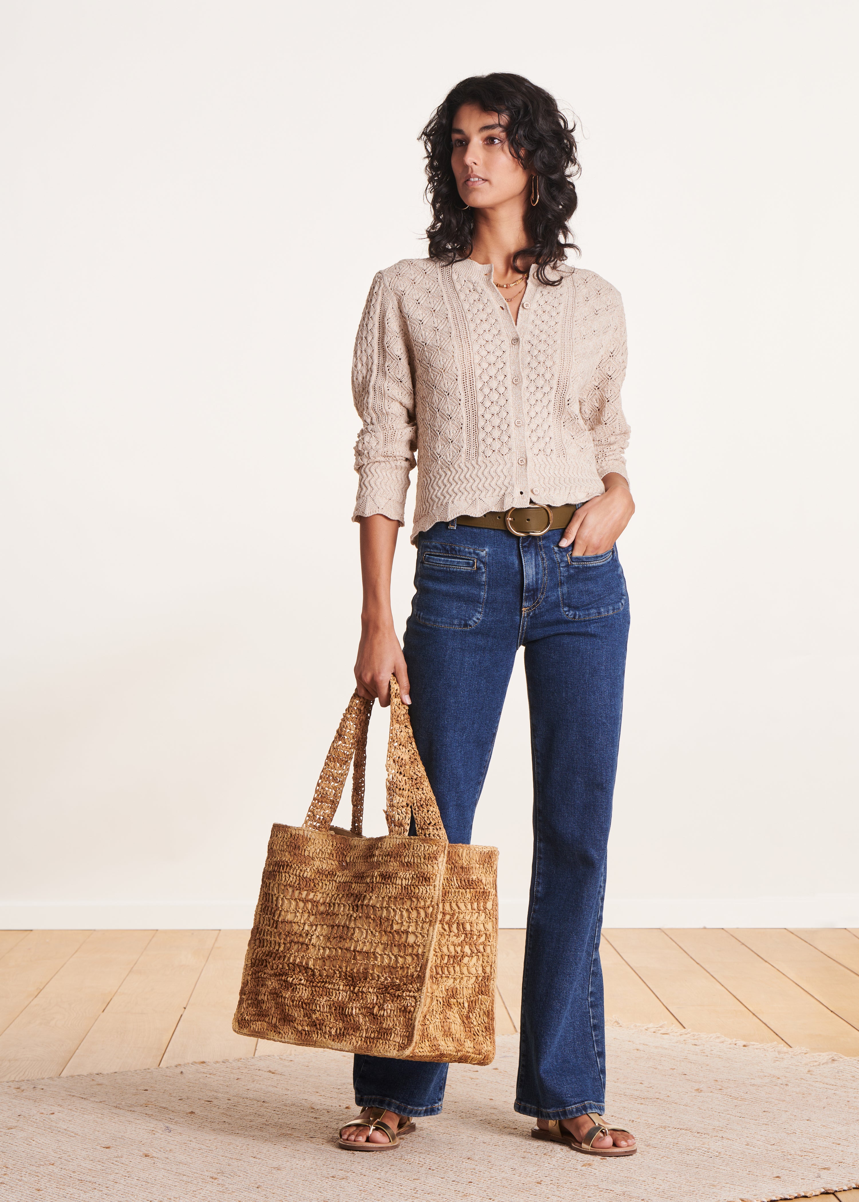 Gilet beige à col rond en maille chinée