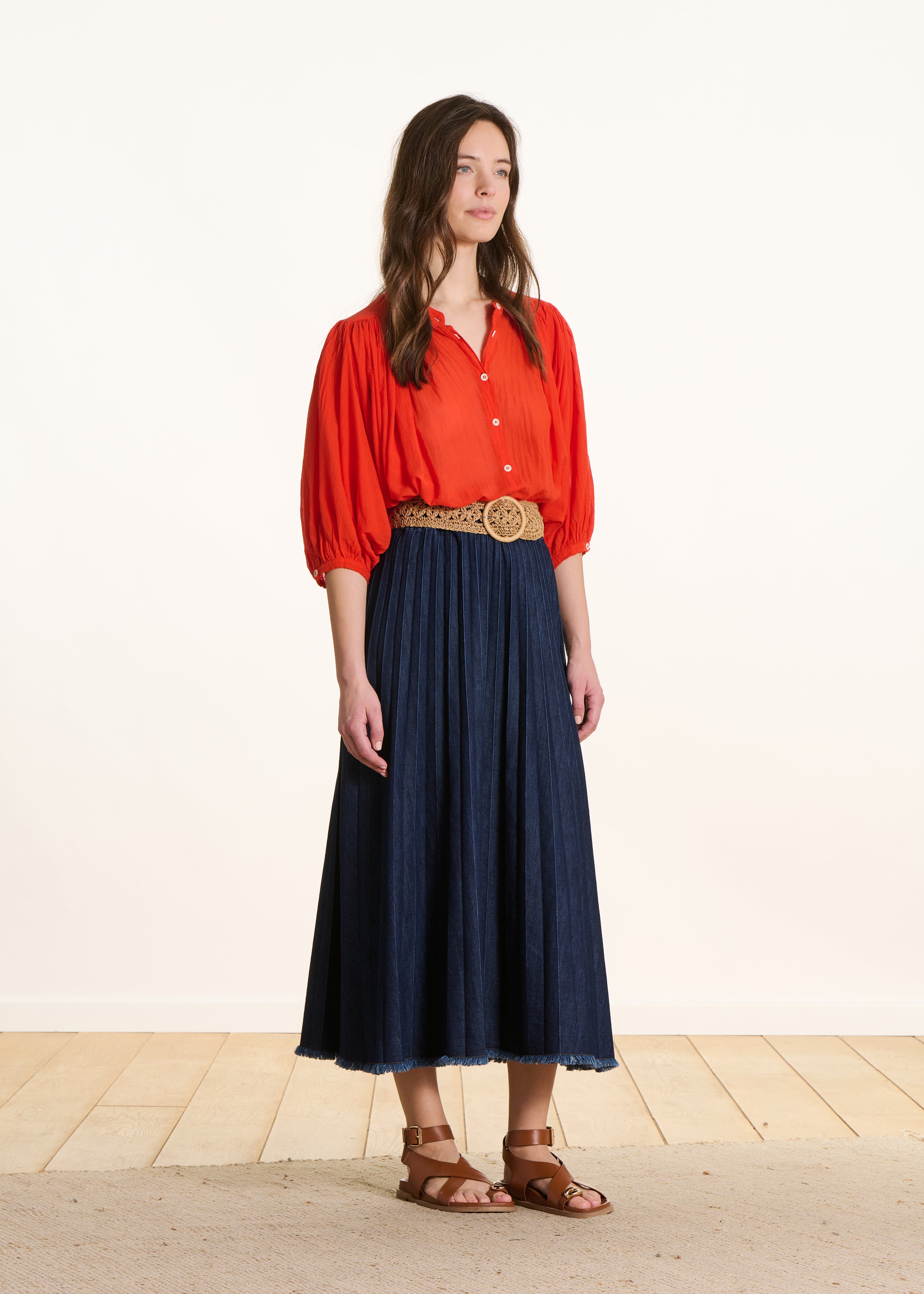 Long pleated skirt in raw denim