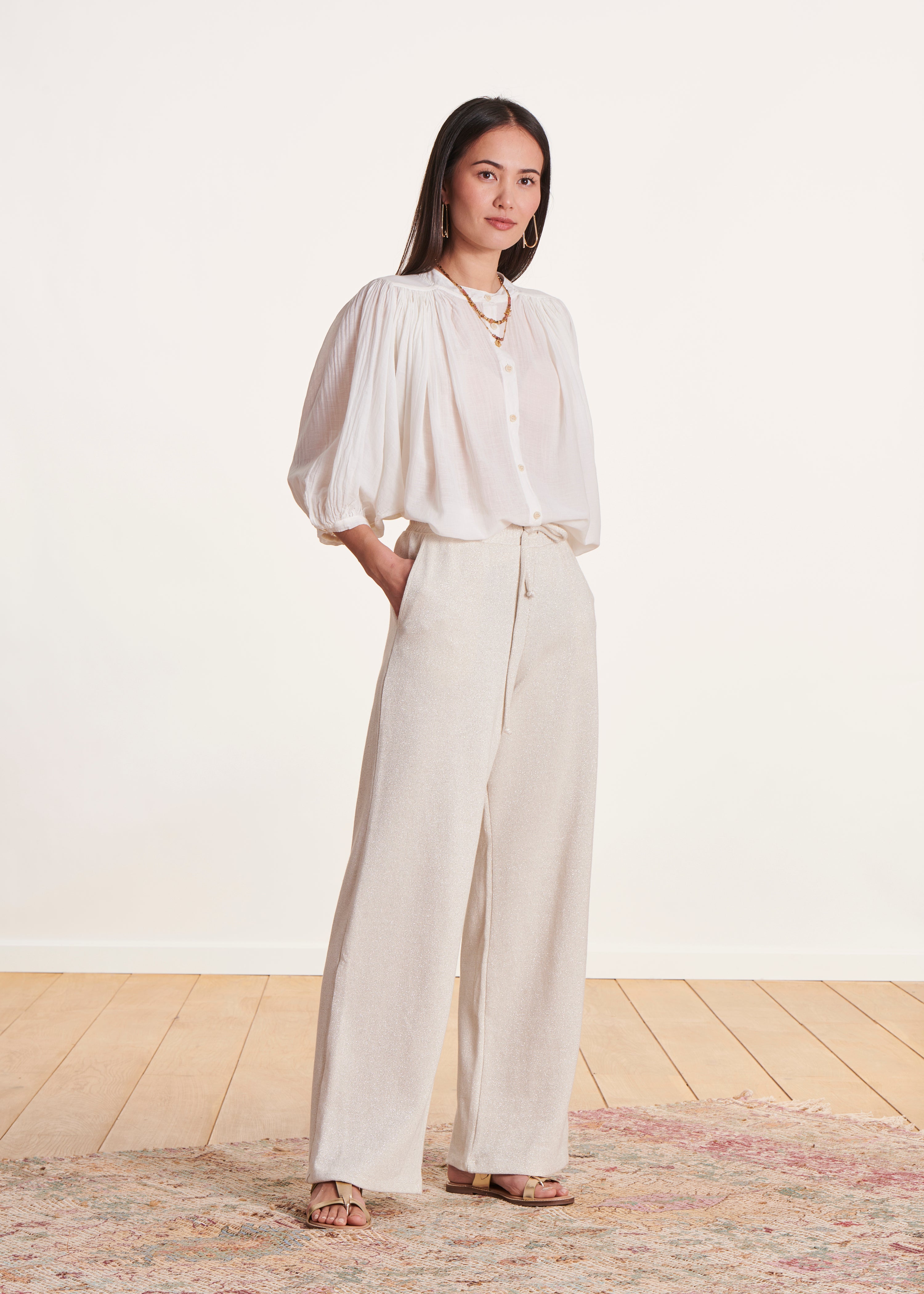 Pantalon large écru en maille à taille élastiquée