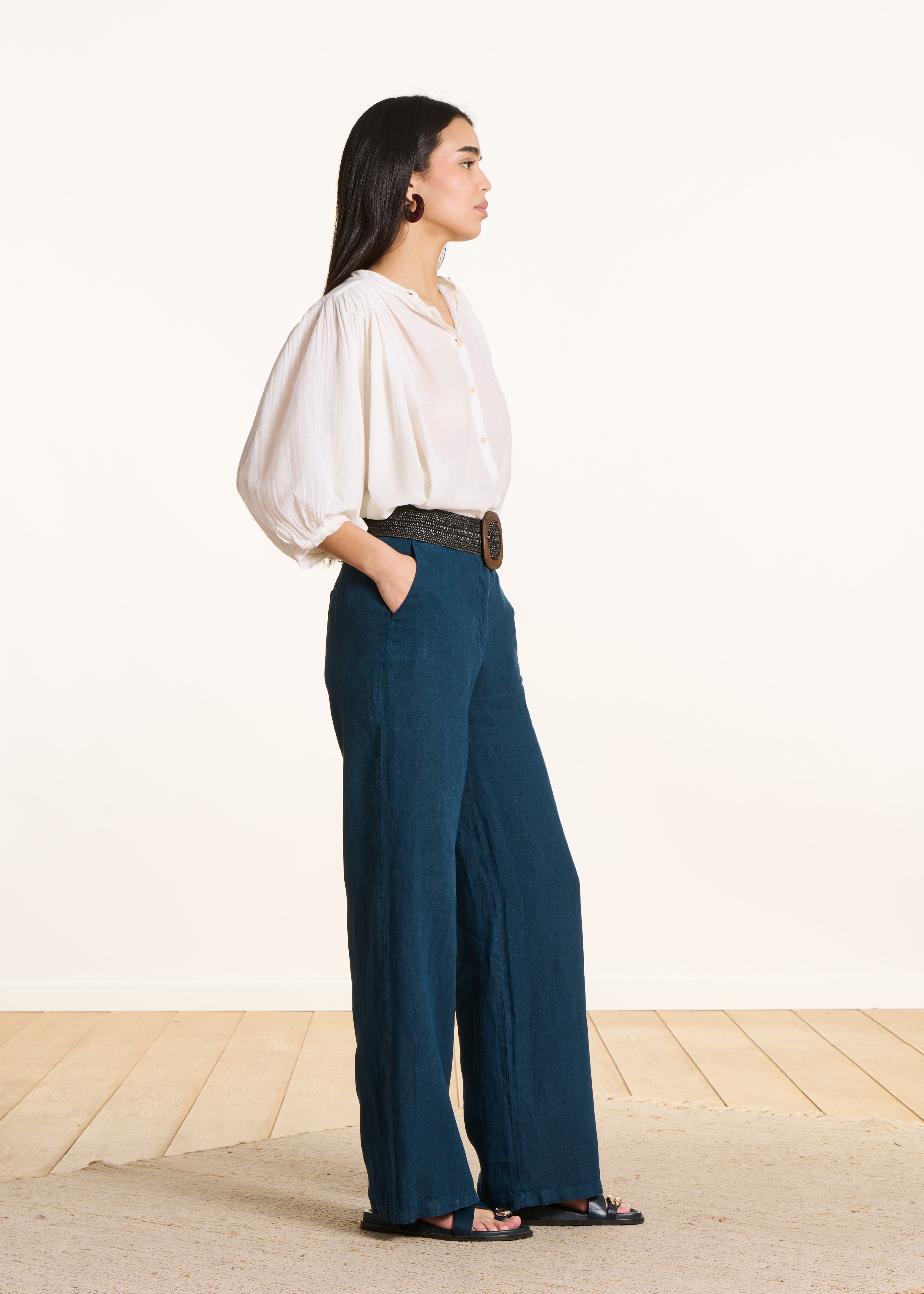 High-waisted straight and wide-leg petrol blue linen trousers