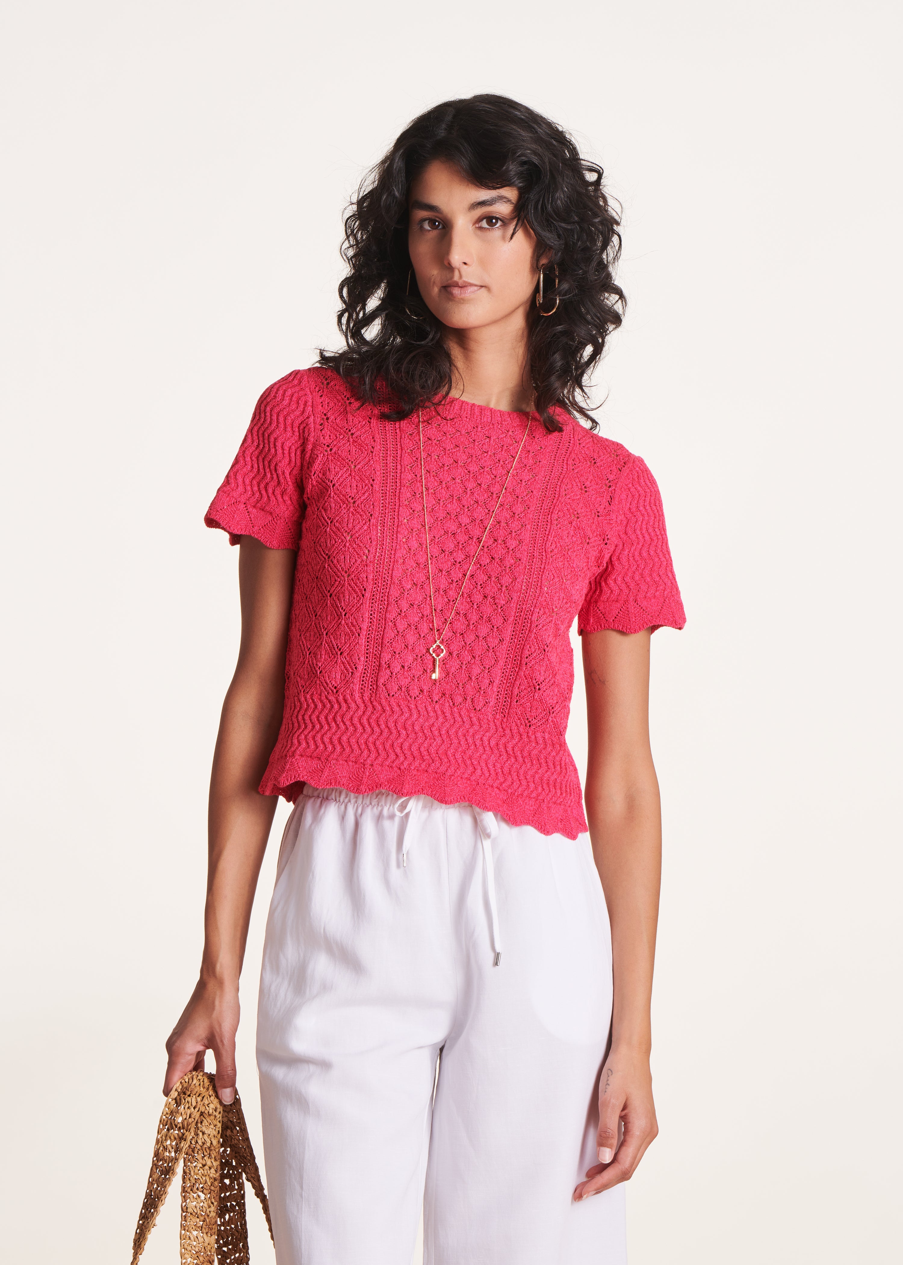 Pull rose fuchsia à manches courtes et col rond