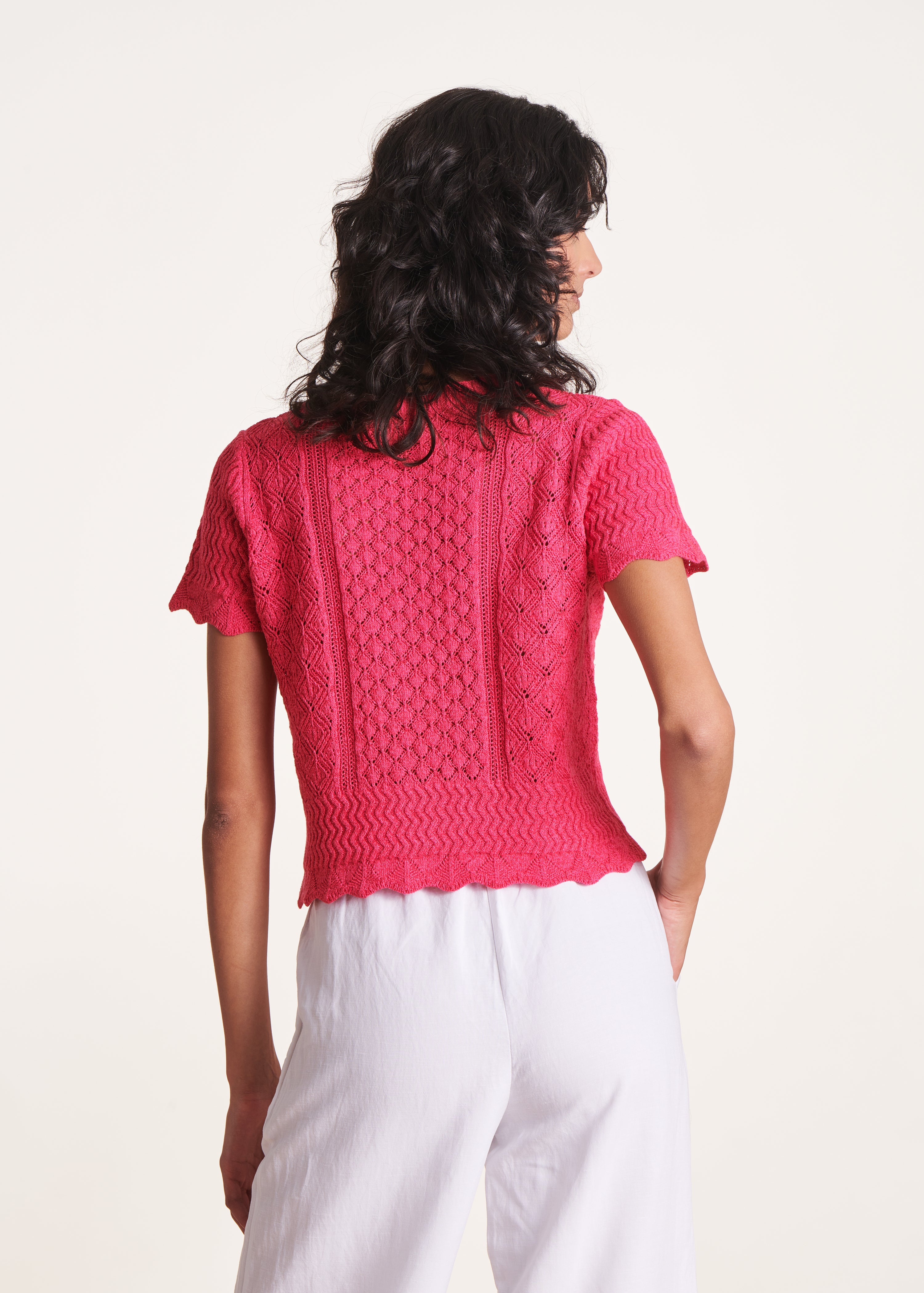 Pull rose fuchsia à manches courtes et col rond