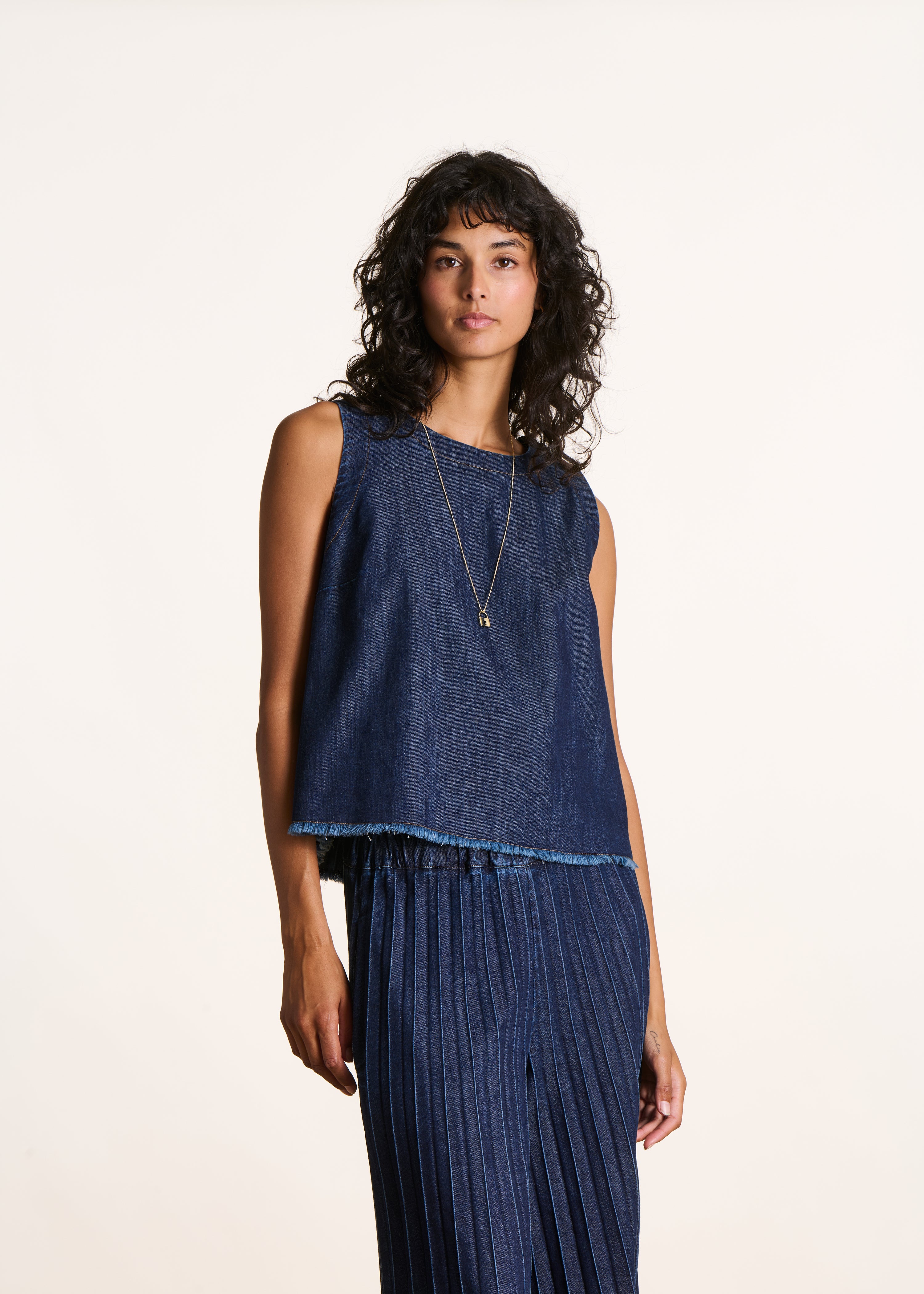 Raw denim sleeveless top