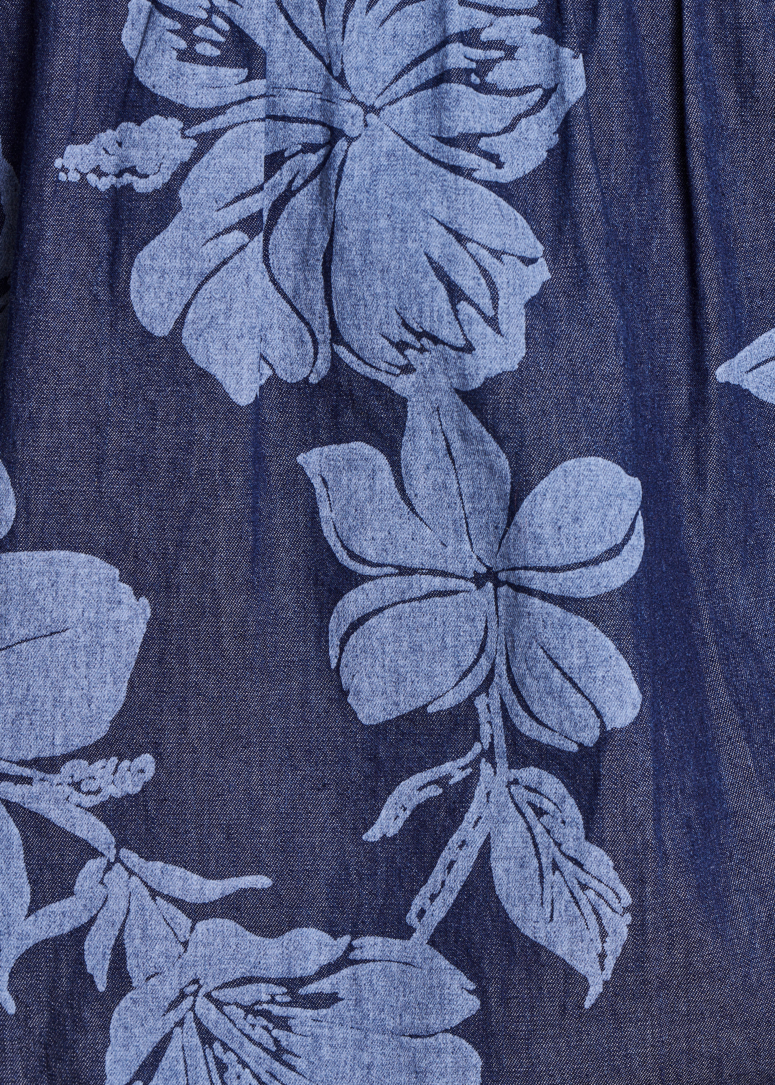 Top in cotone chambray blu con stampa floreale