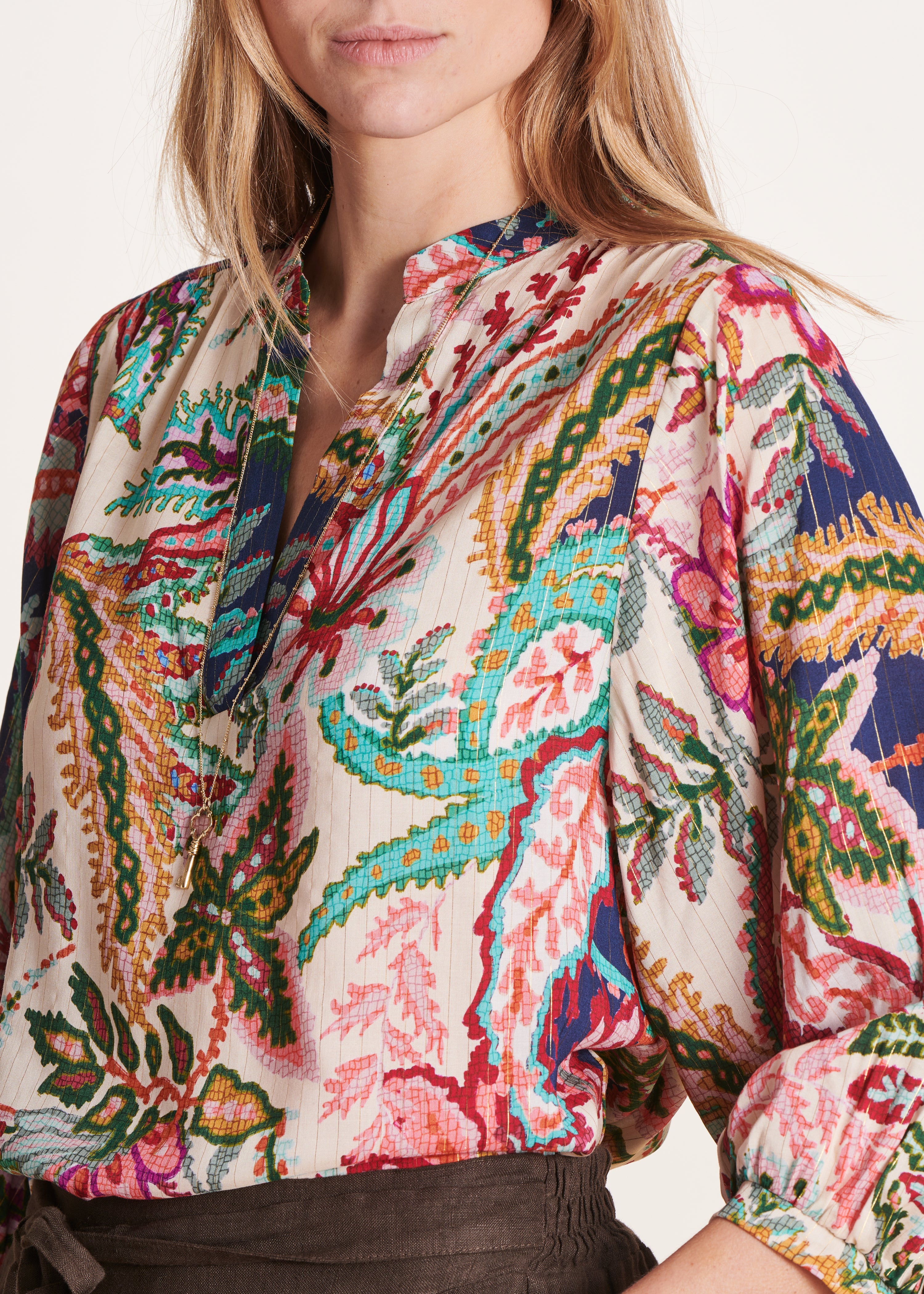 Loose-fitting pink and blue floral print top