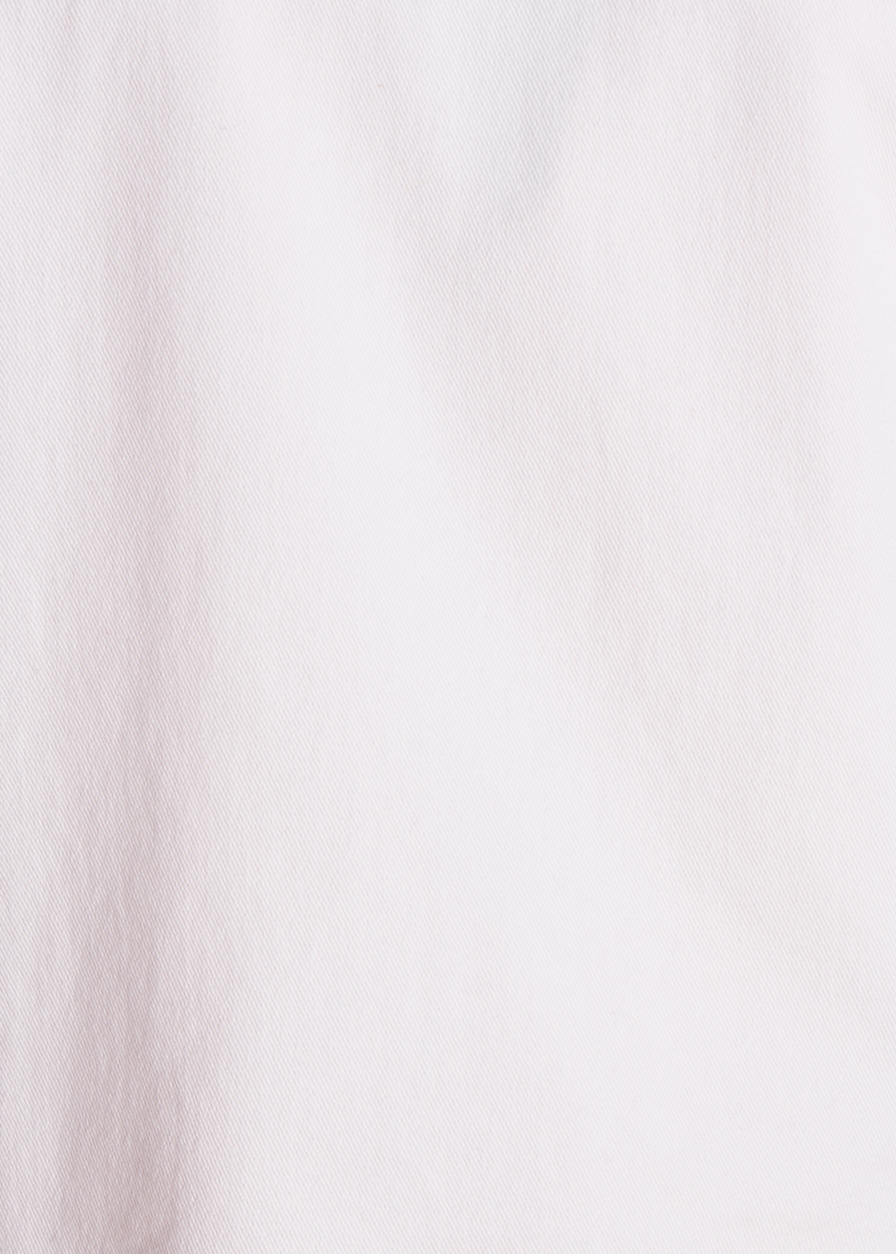 Short fitted white jacket in organic cotton