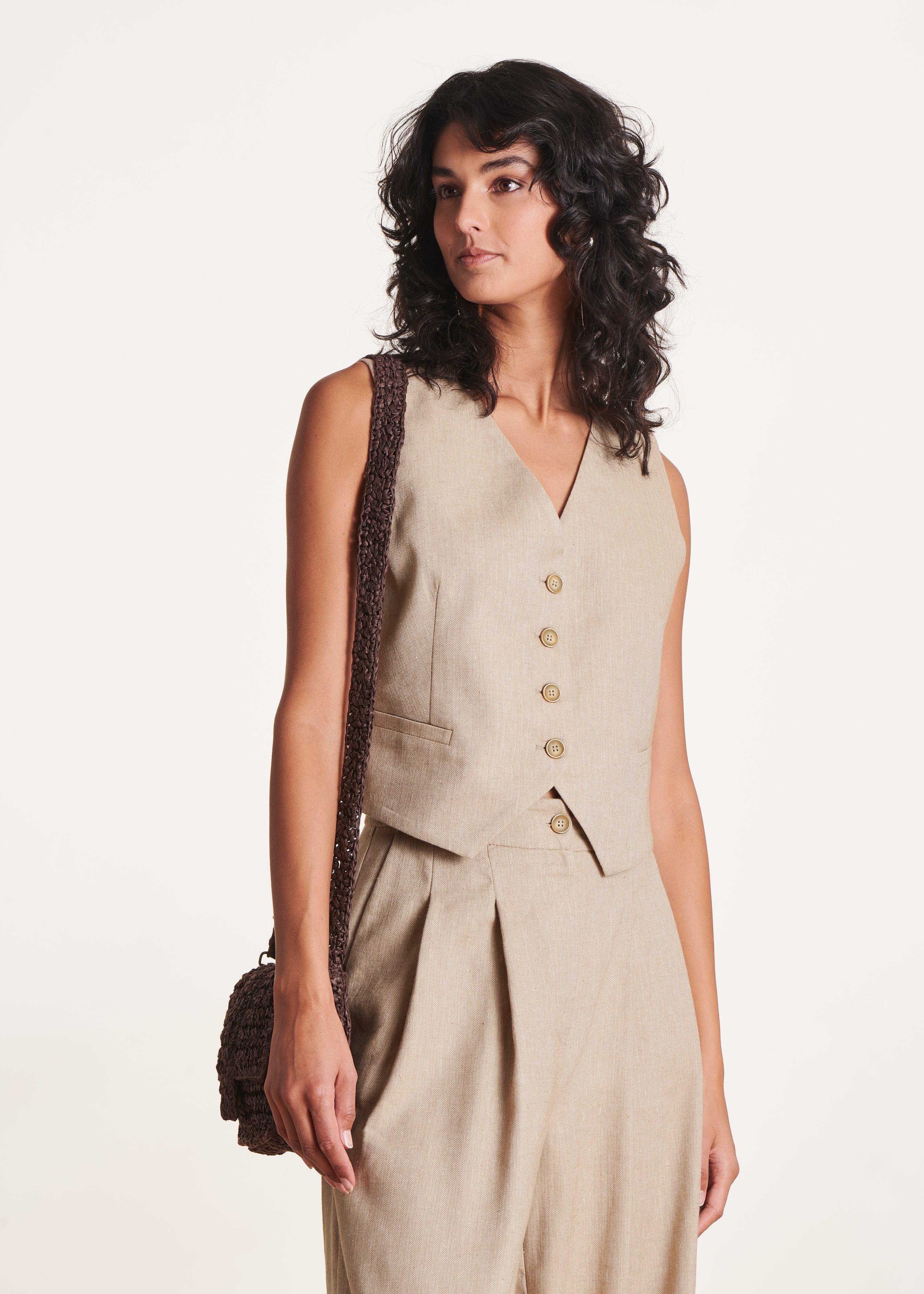 Veste sans manches beige cintrée