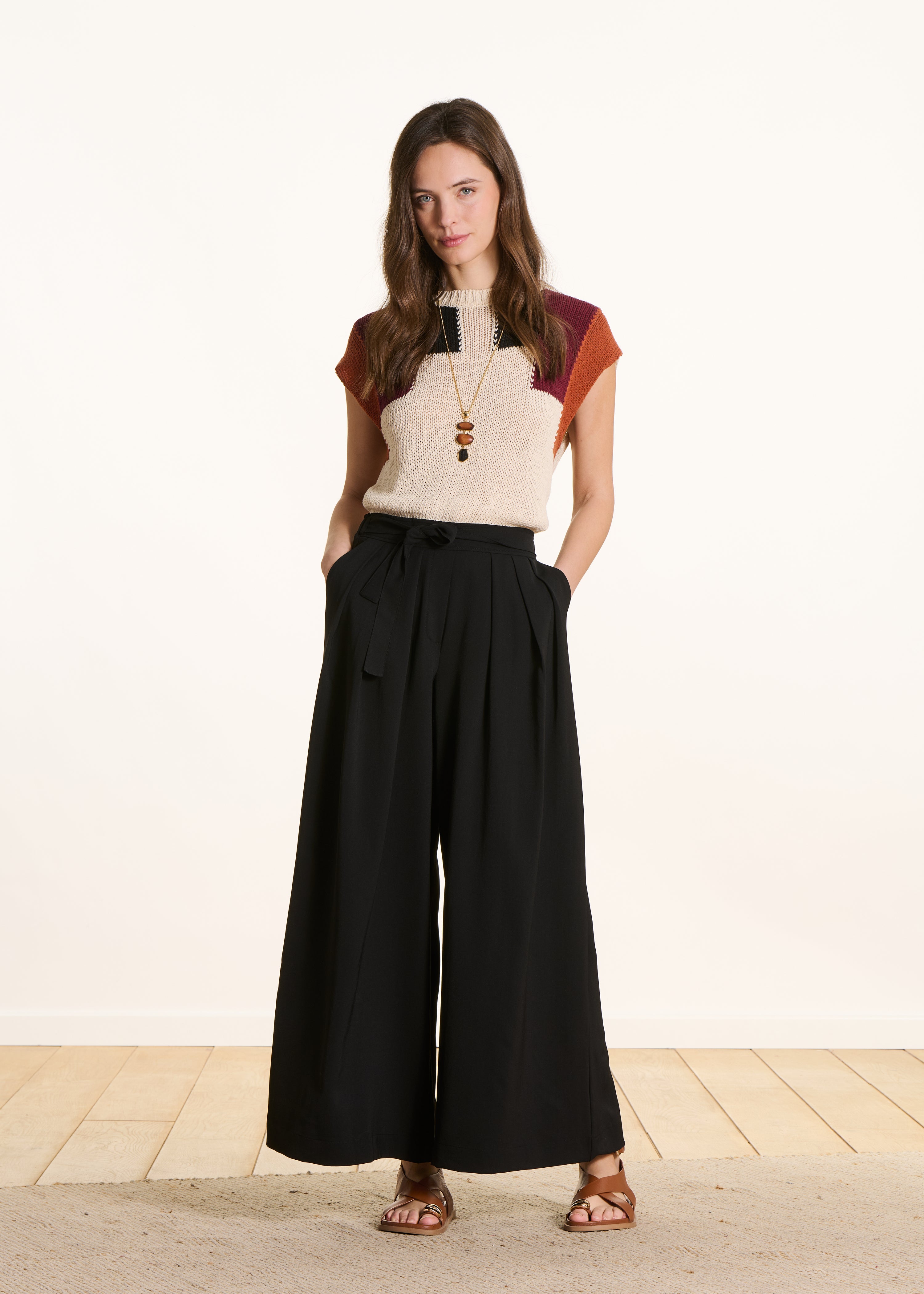 Wide black pleated pants with elastic waist