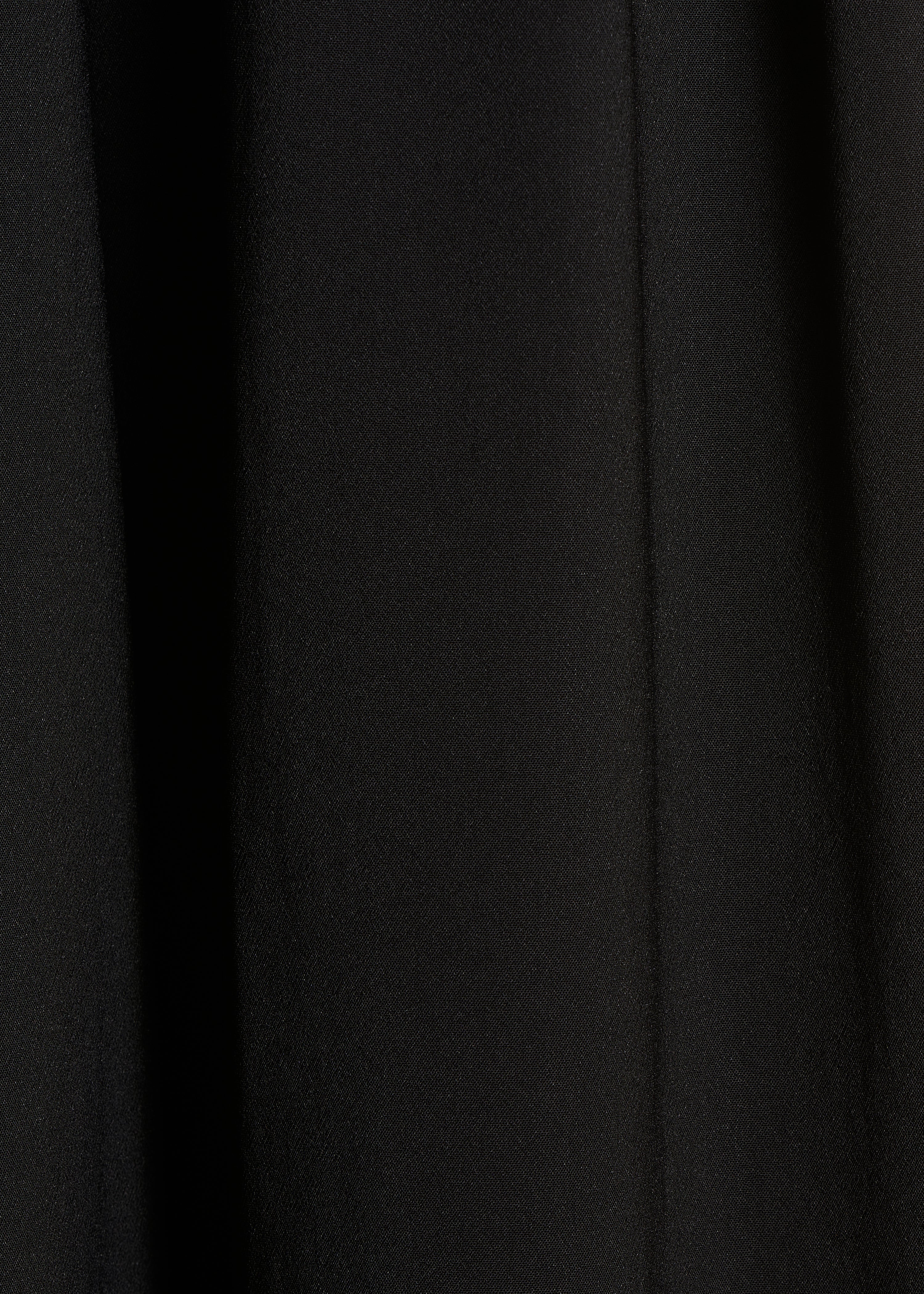 Wide black pleated pants with elastic waist