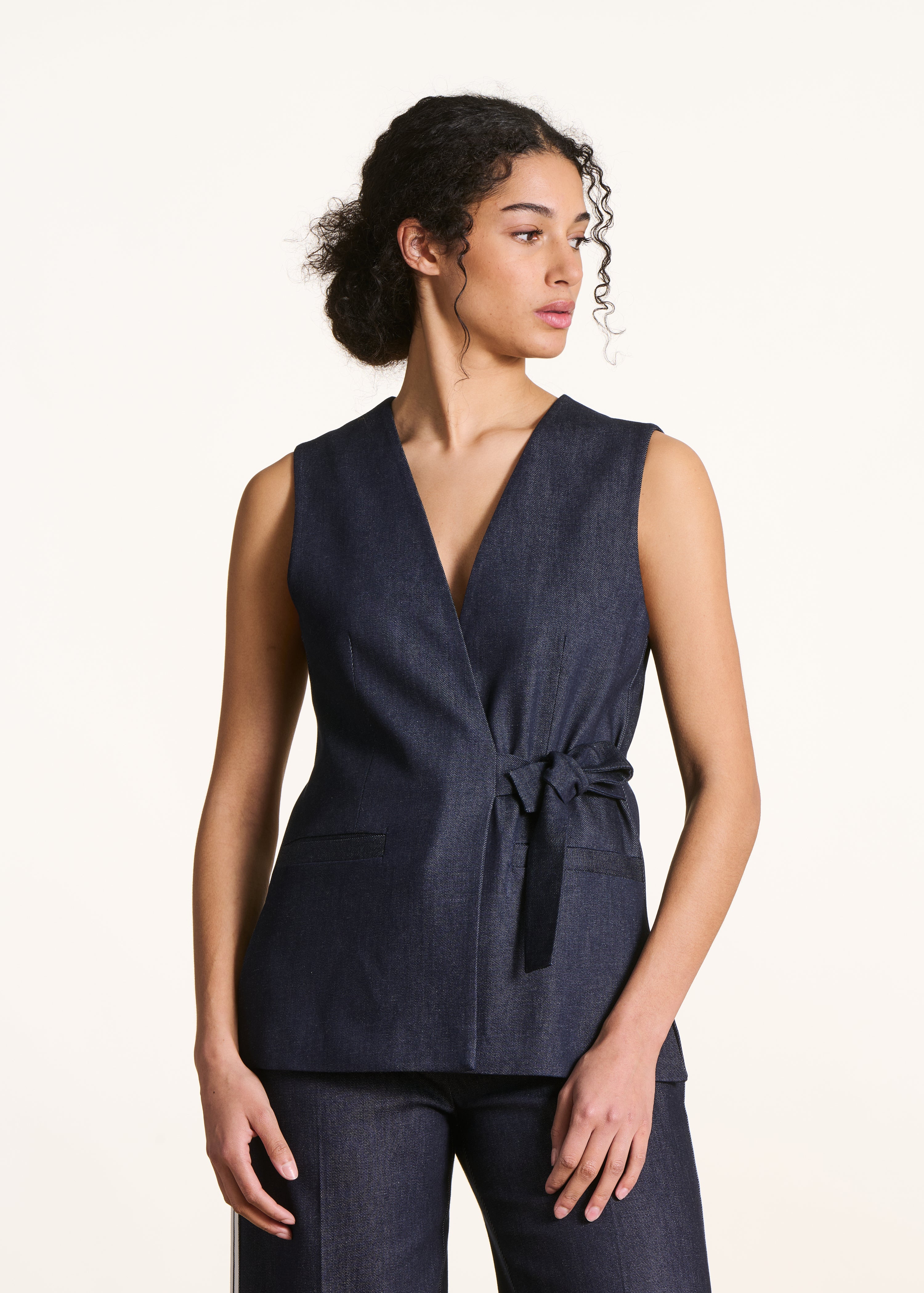 Raw denim sleeveless jacket