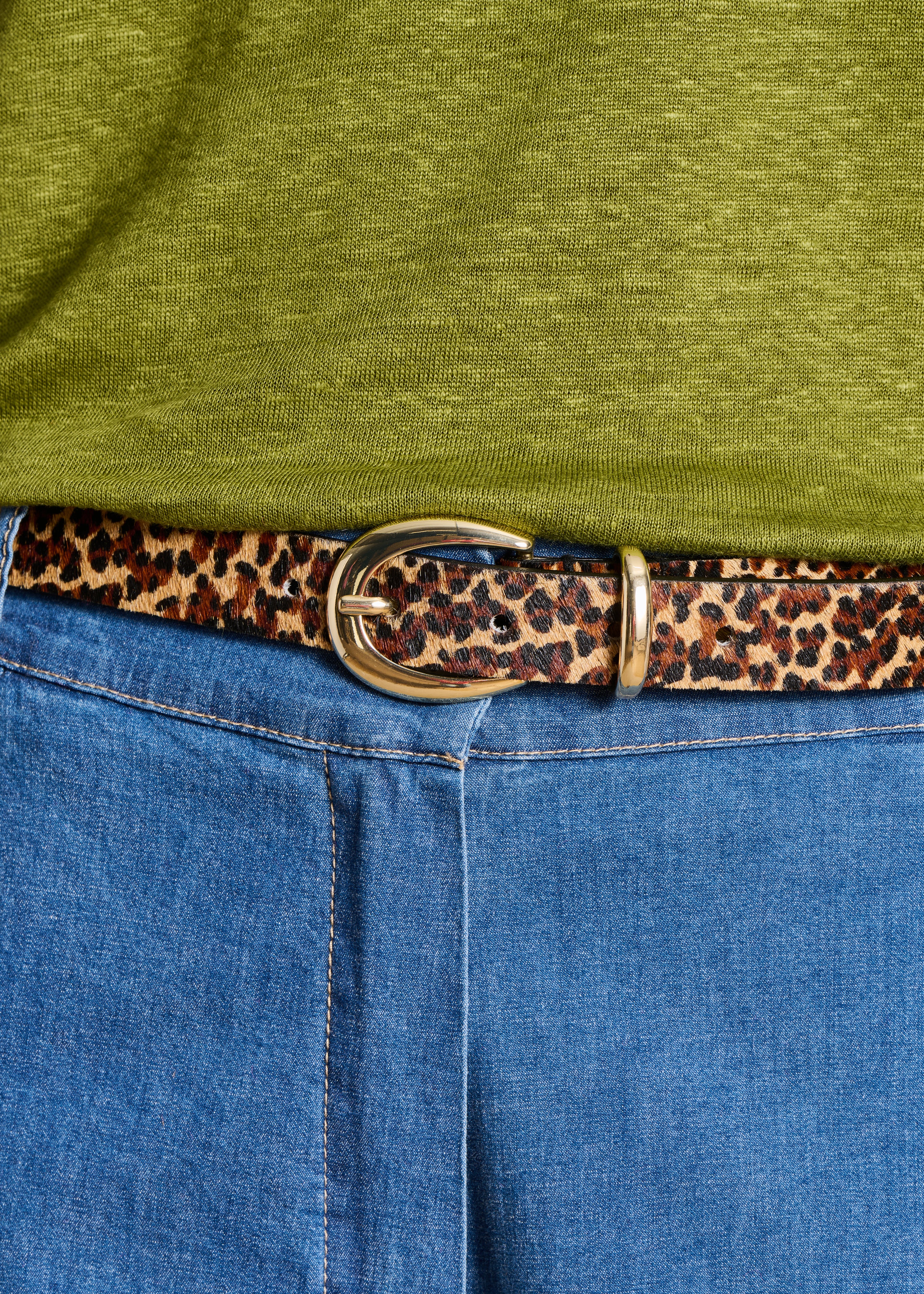 Thin brown leather belt with animal print