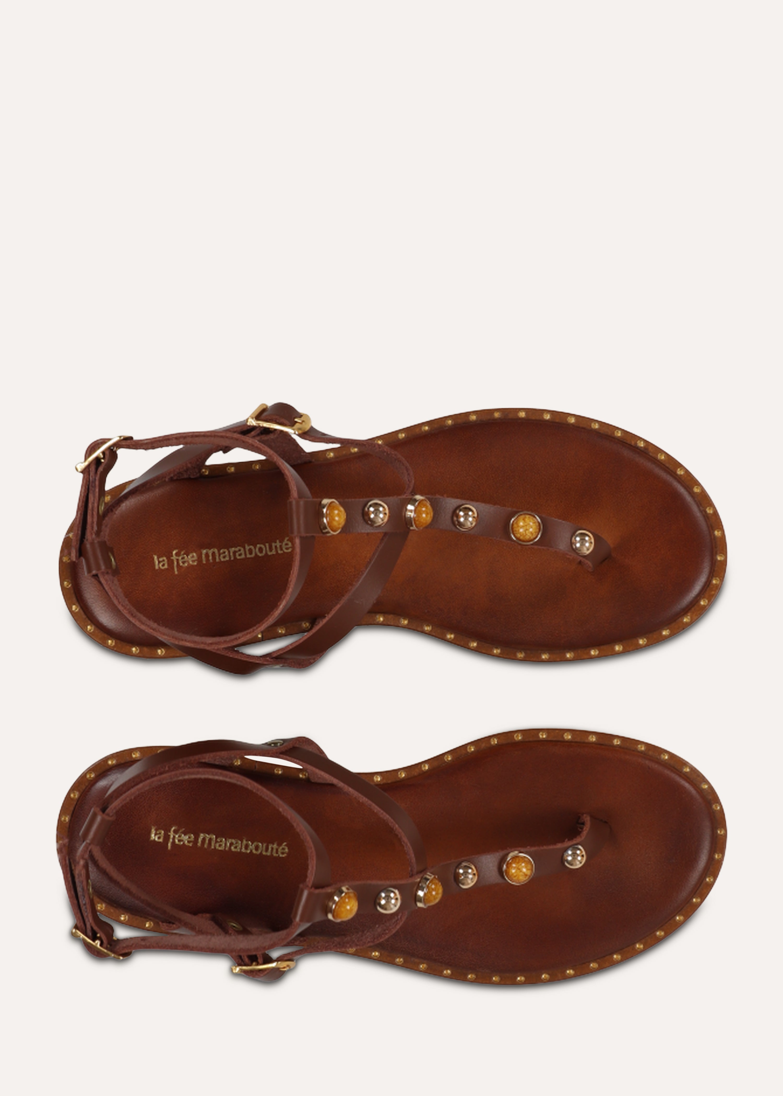 Brown leather flat sandals with jewel detail