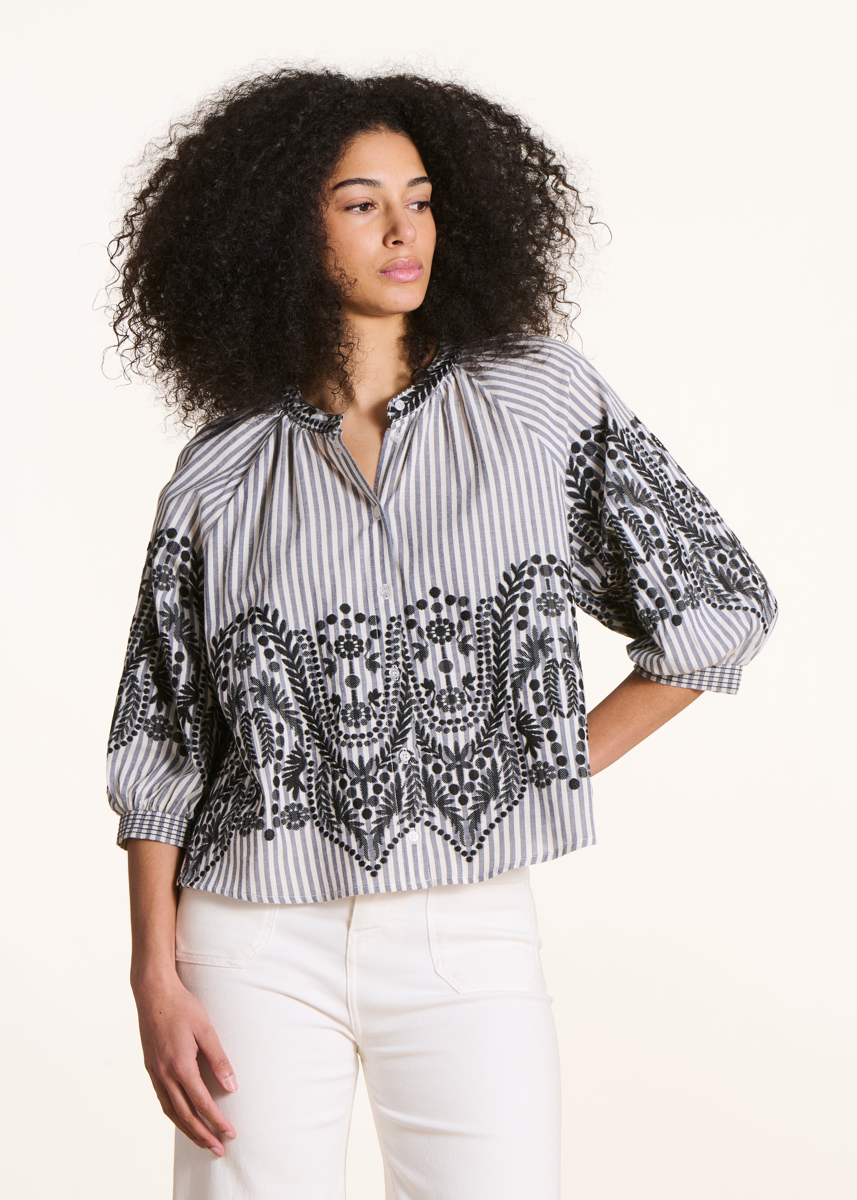 Loose black shirt with stripes and jacquard pattern