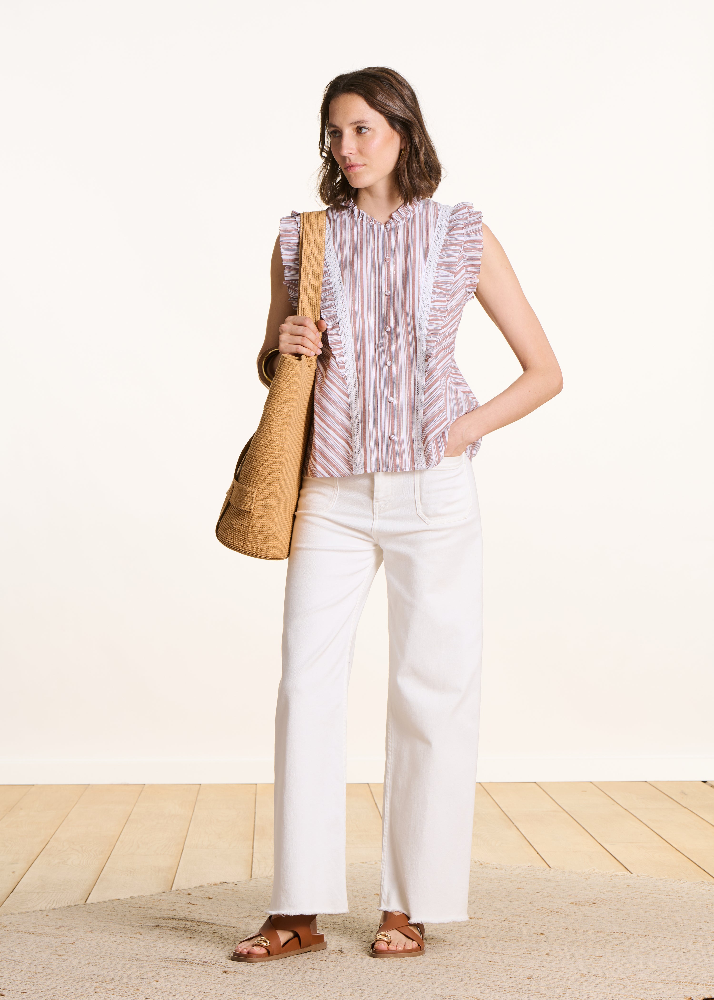 Camisa sin mangas a rayas blanco y marrón