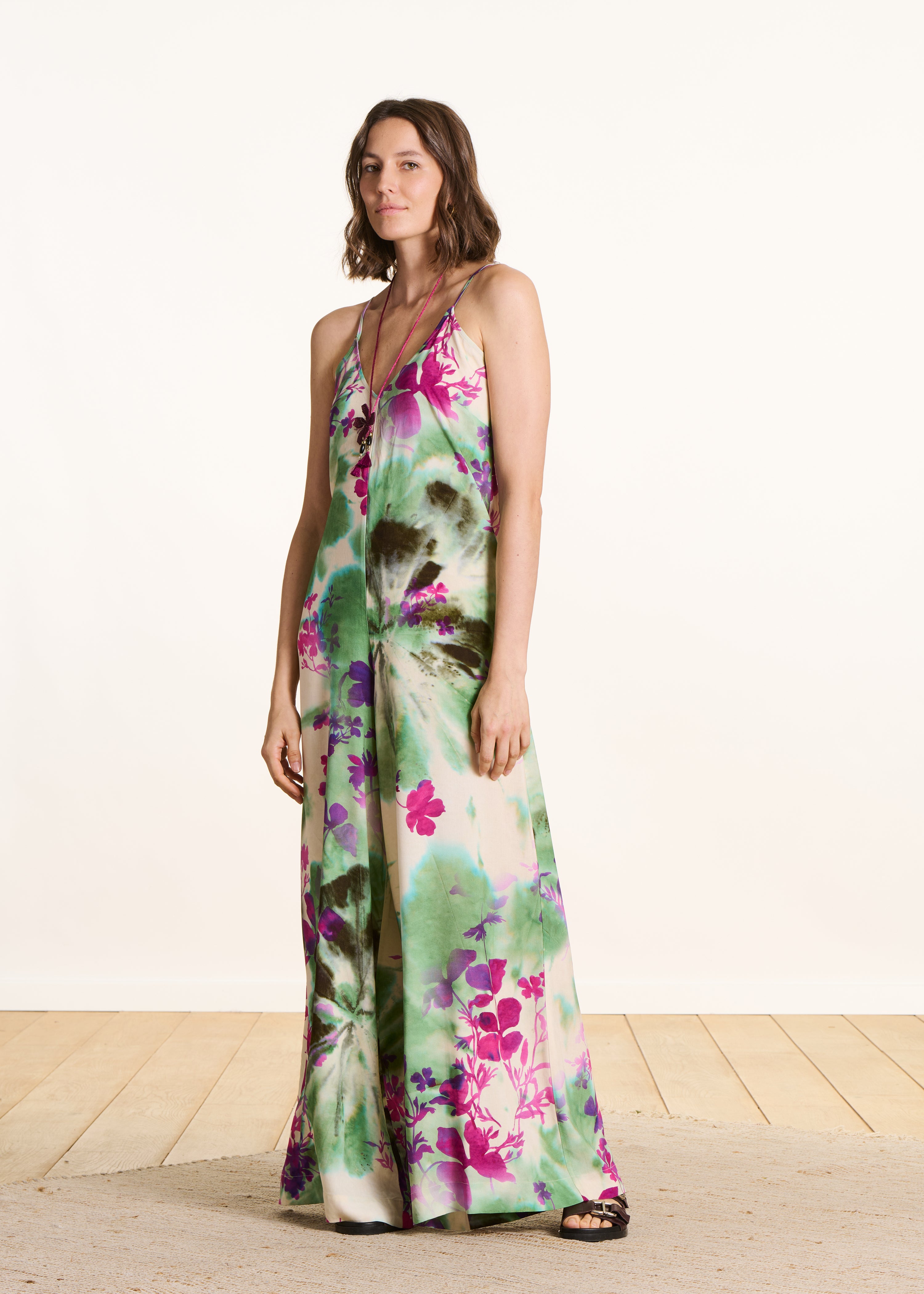 Green and pink floral print jumpsuit with straps