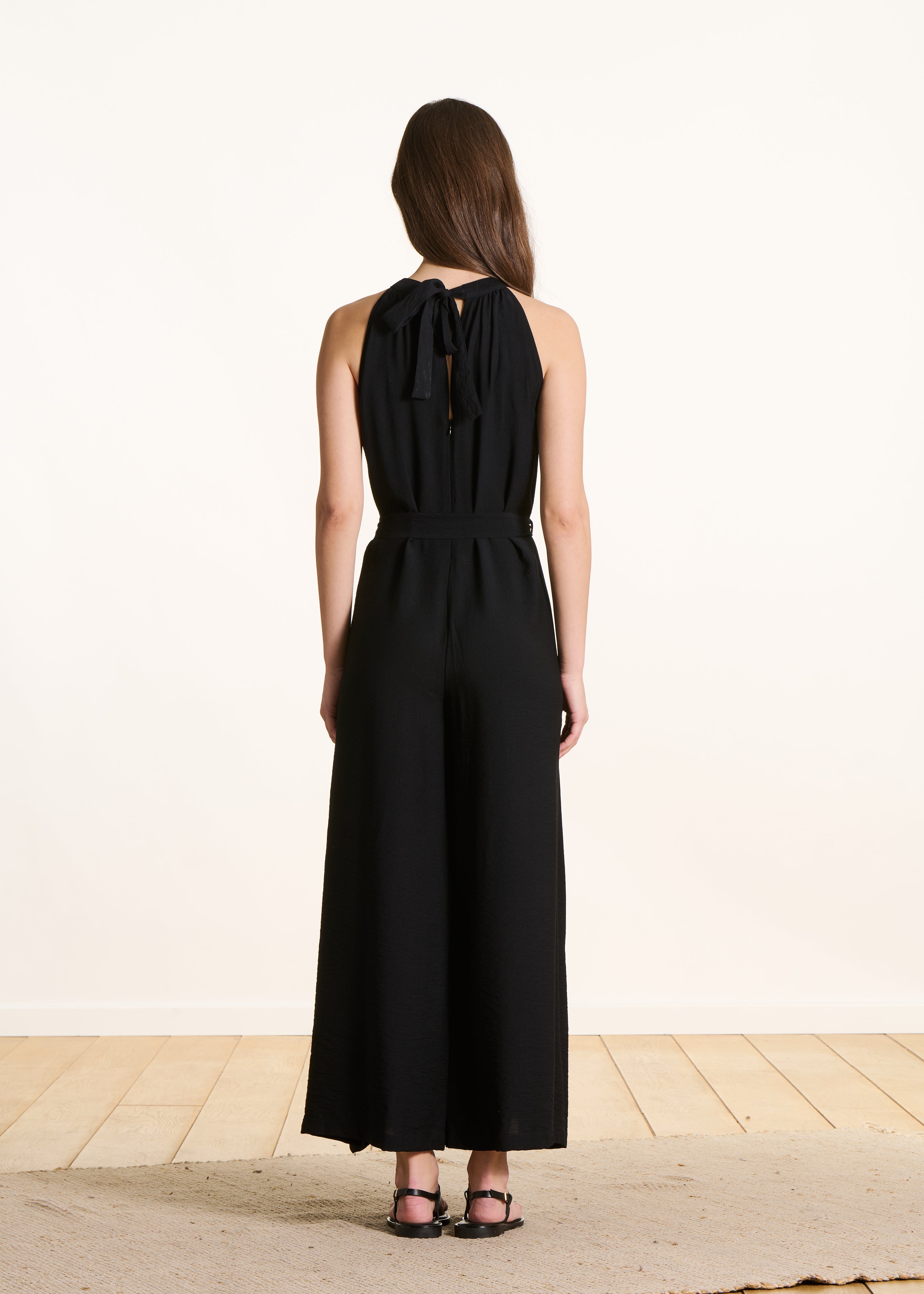 Tuta lunga fluida nera in jacquard