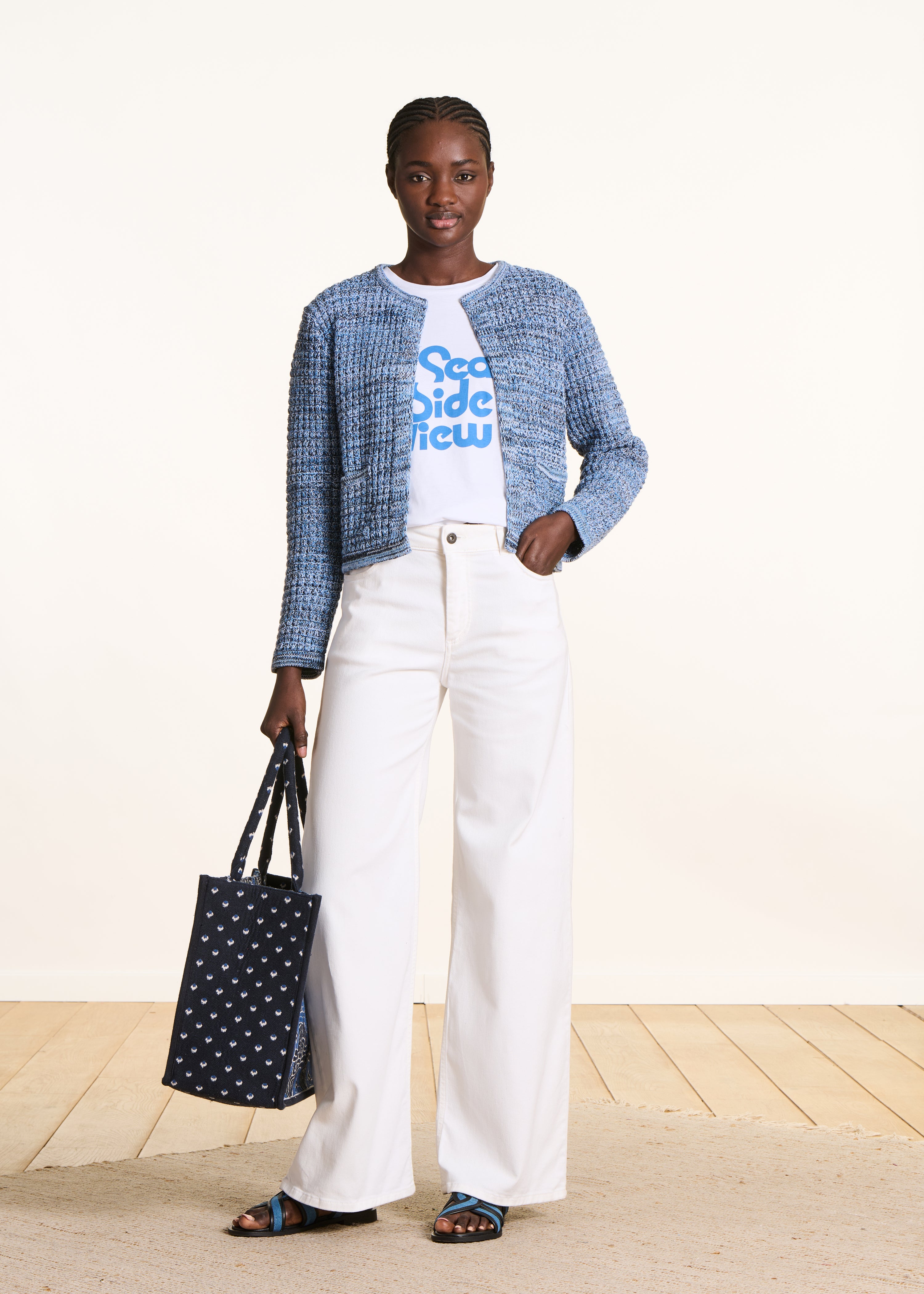 Open blue cardigan in marl knit