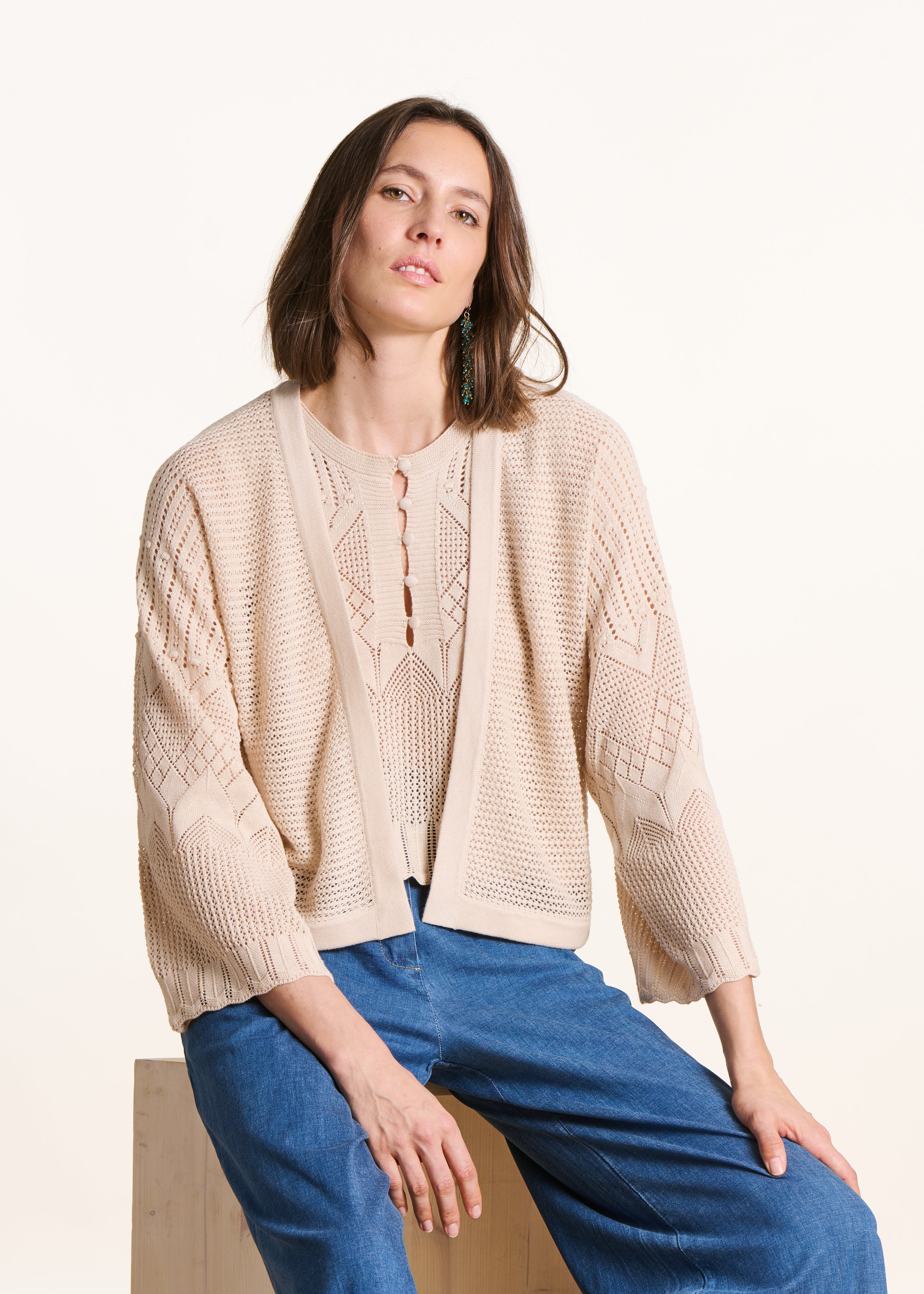 Beige cropped cardigan in pointelle knit