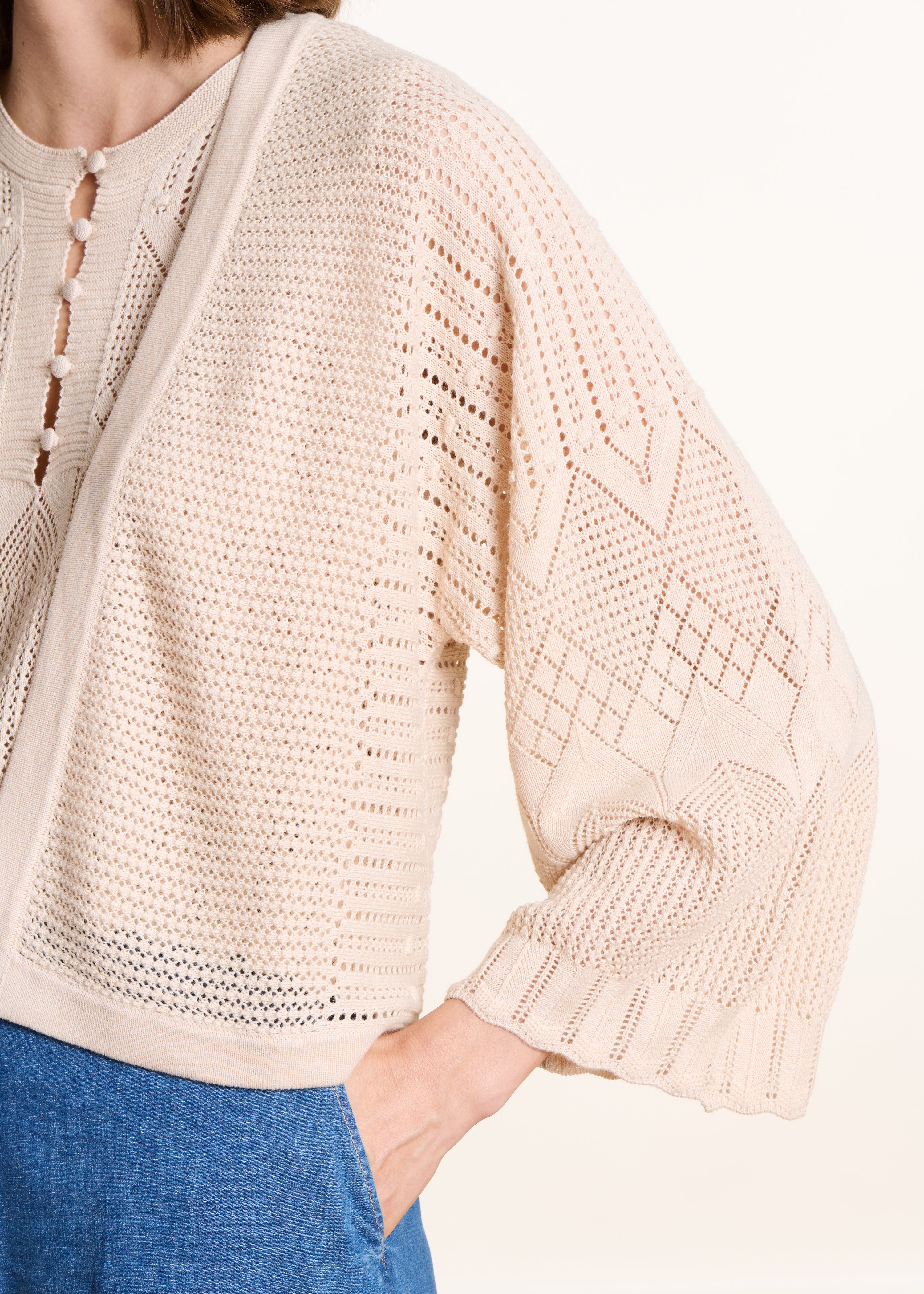 Gilet corto beige in maglia pointelle