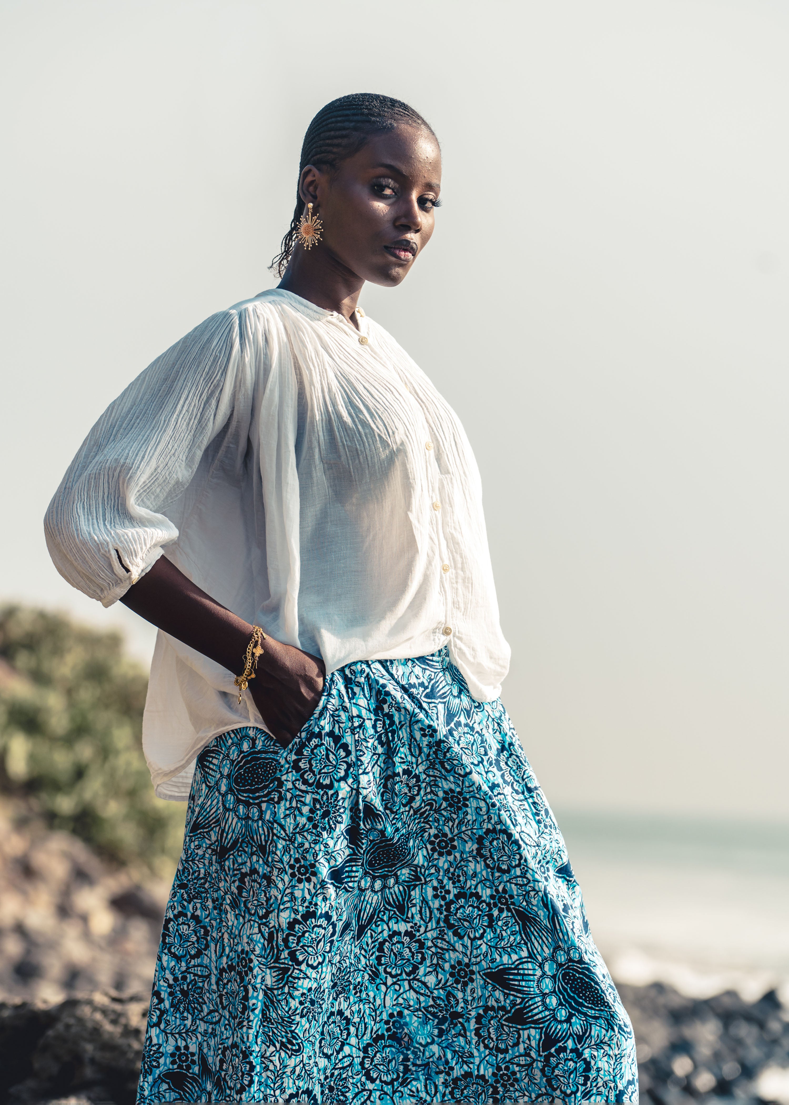 Long blue cotton poplin skirt with floral print