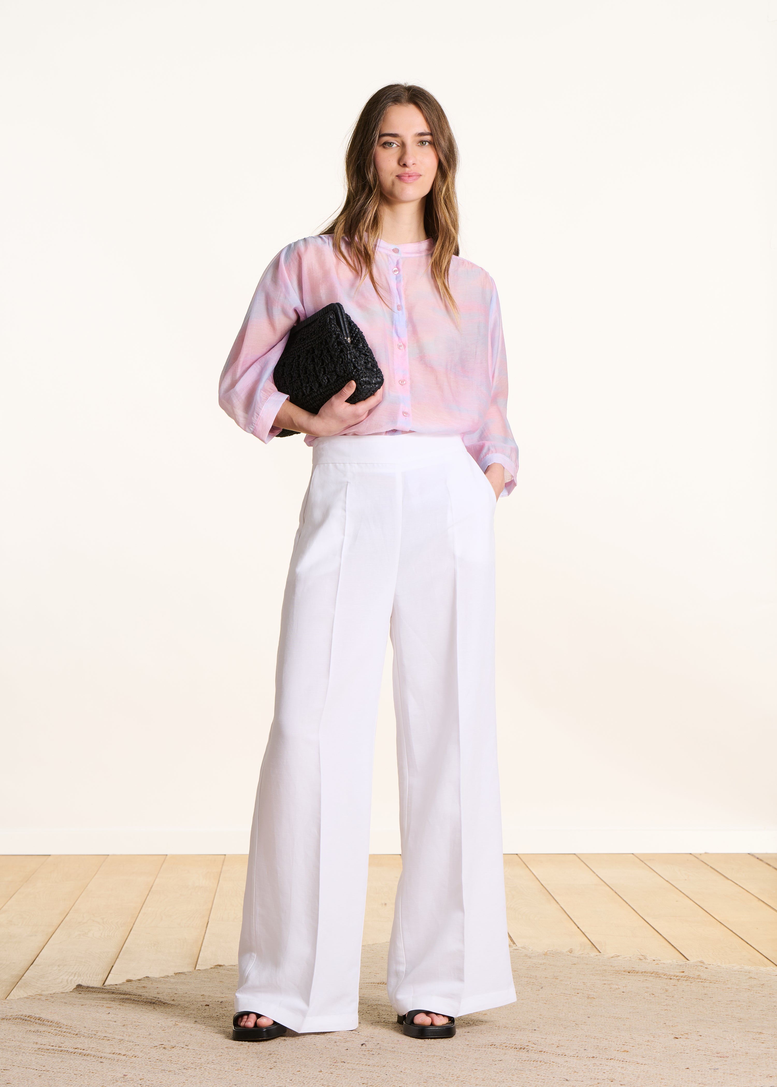 Wide white high-waisted trousers