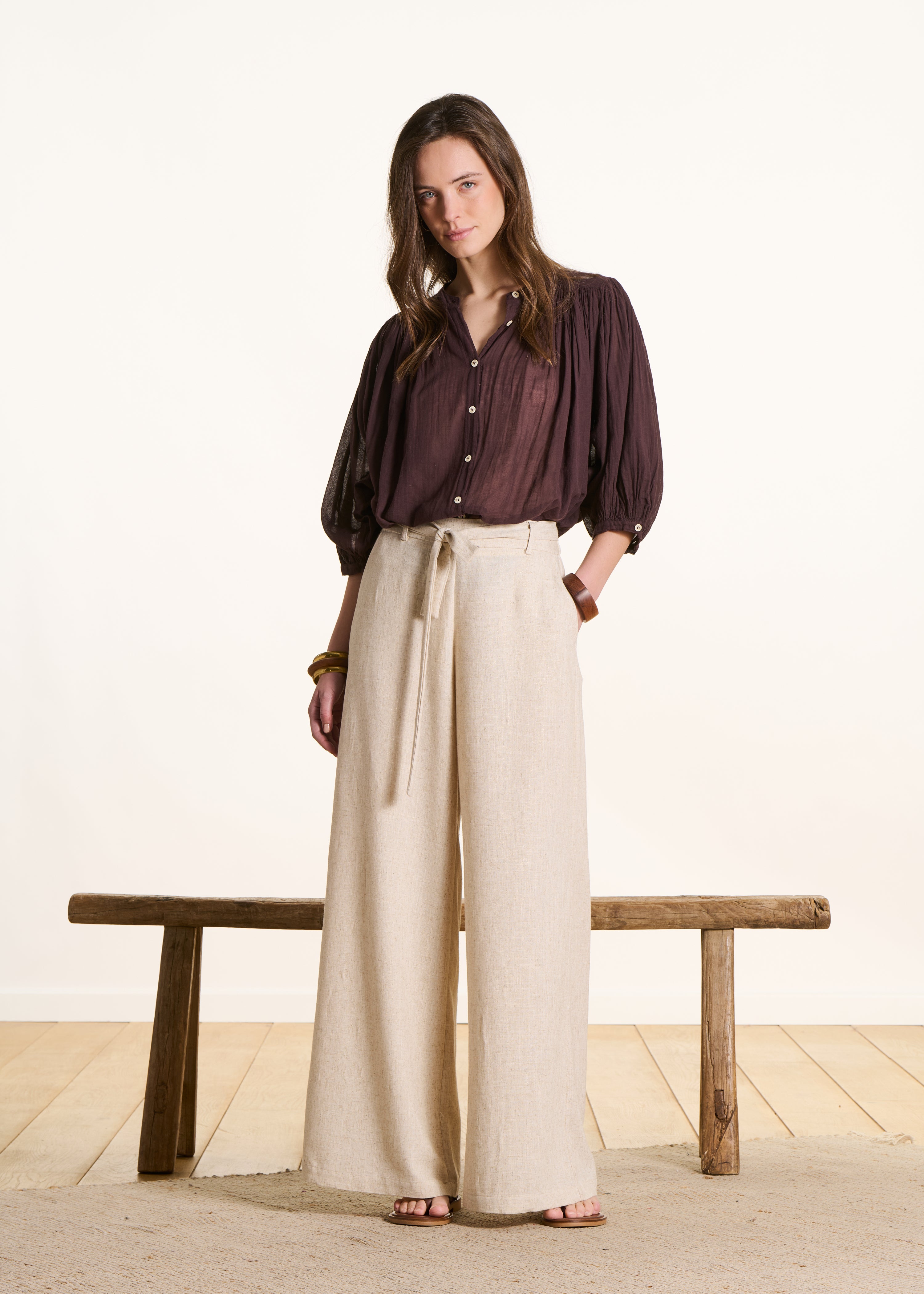 Beige wide-leg pants with tie belt