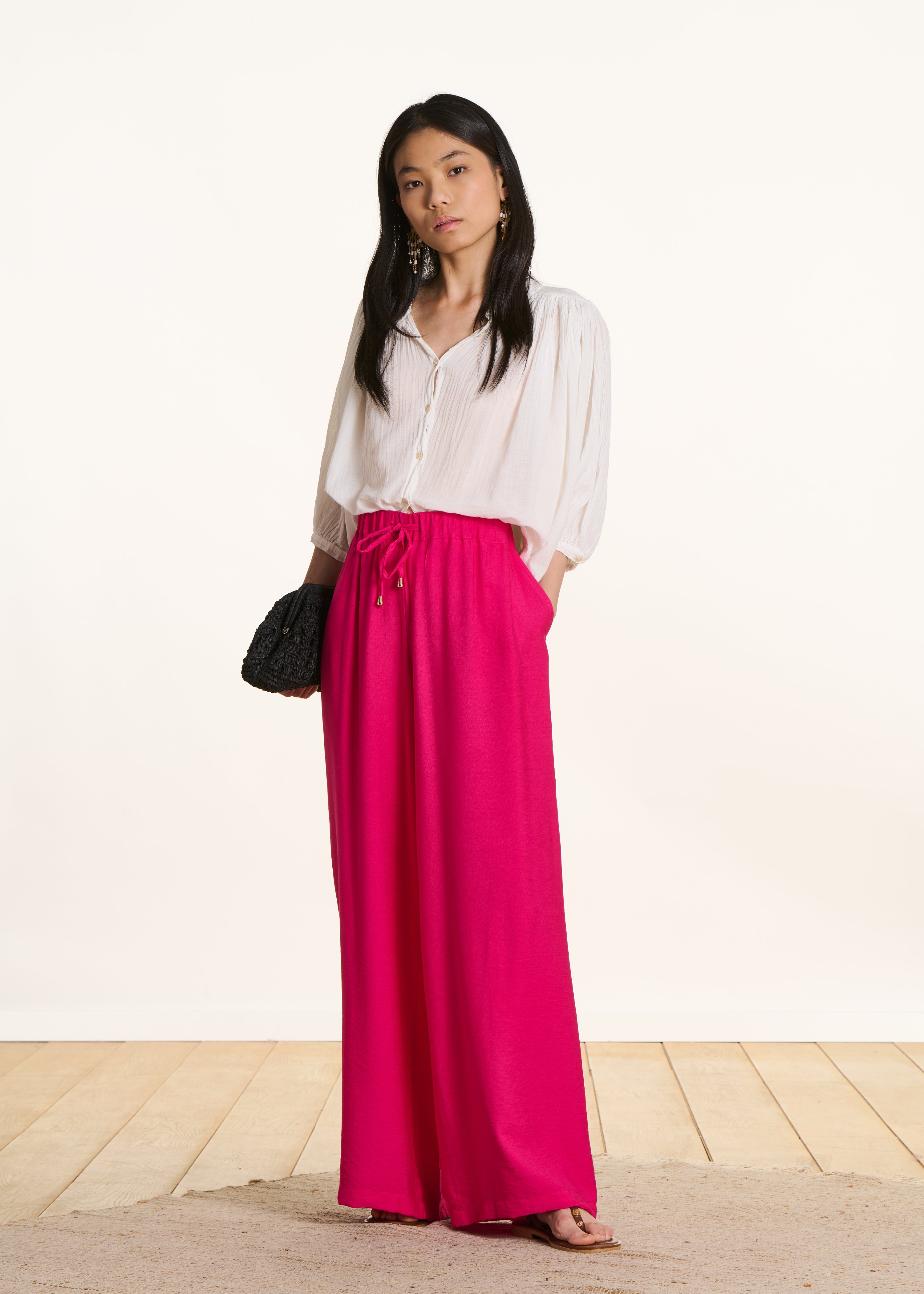 Wijde broek in fuchsia roze met elastische taille
