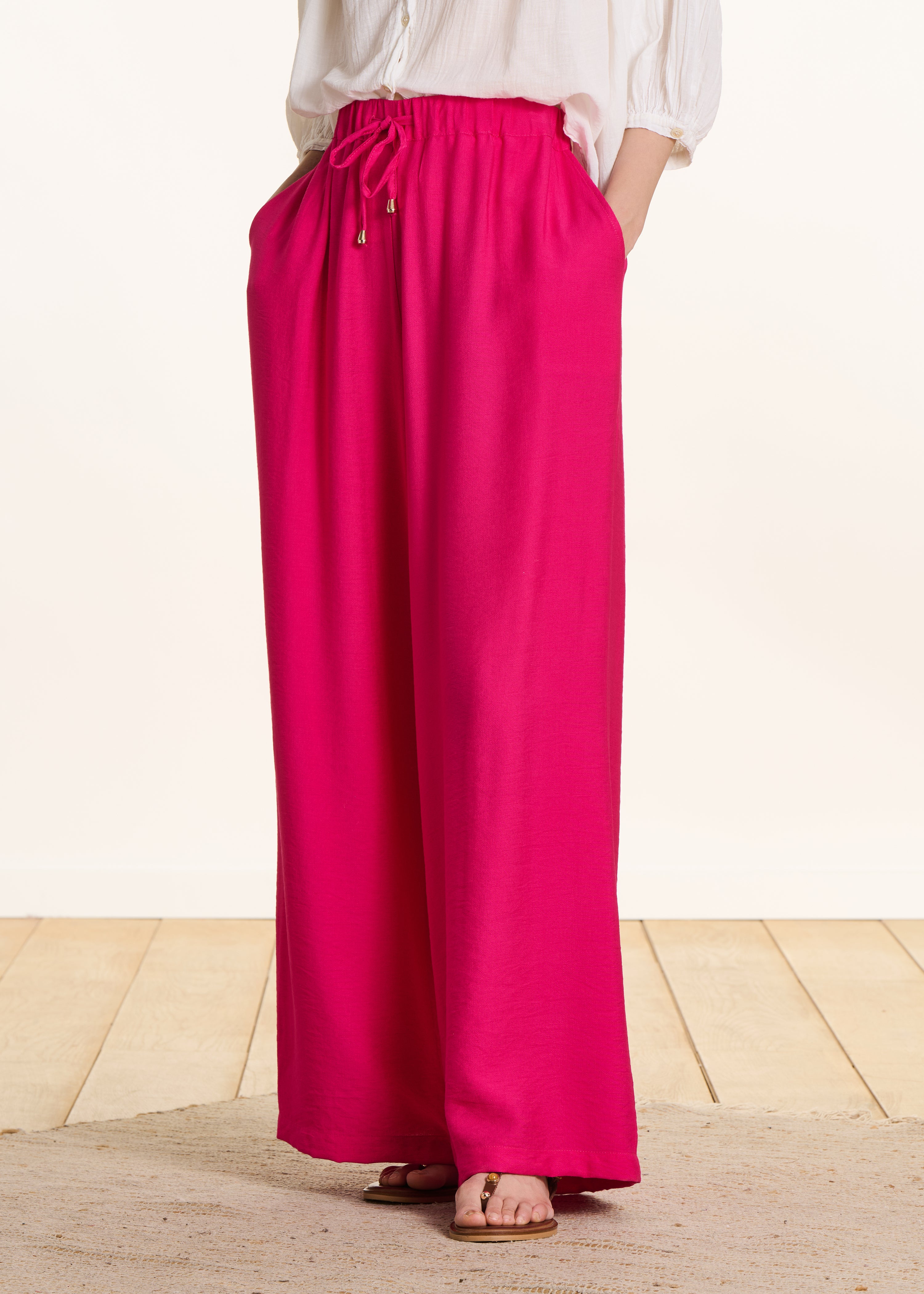Wide fuchsia pink pants with elastic waistband