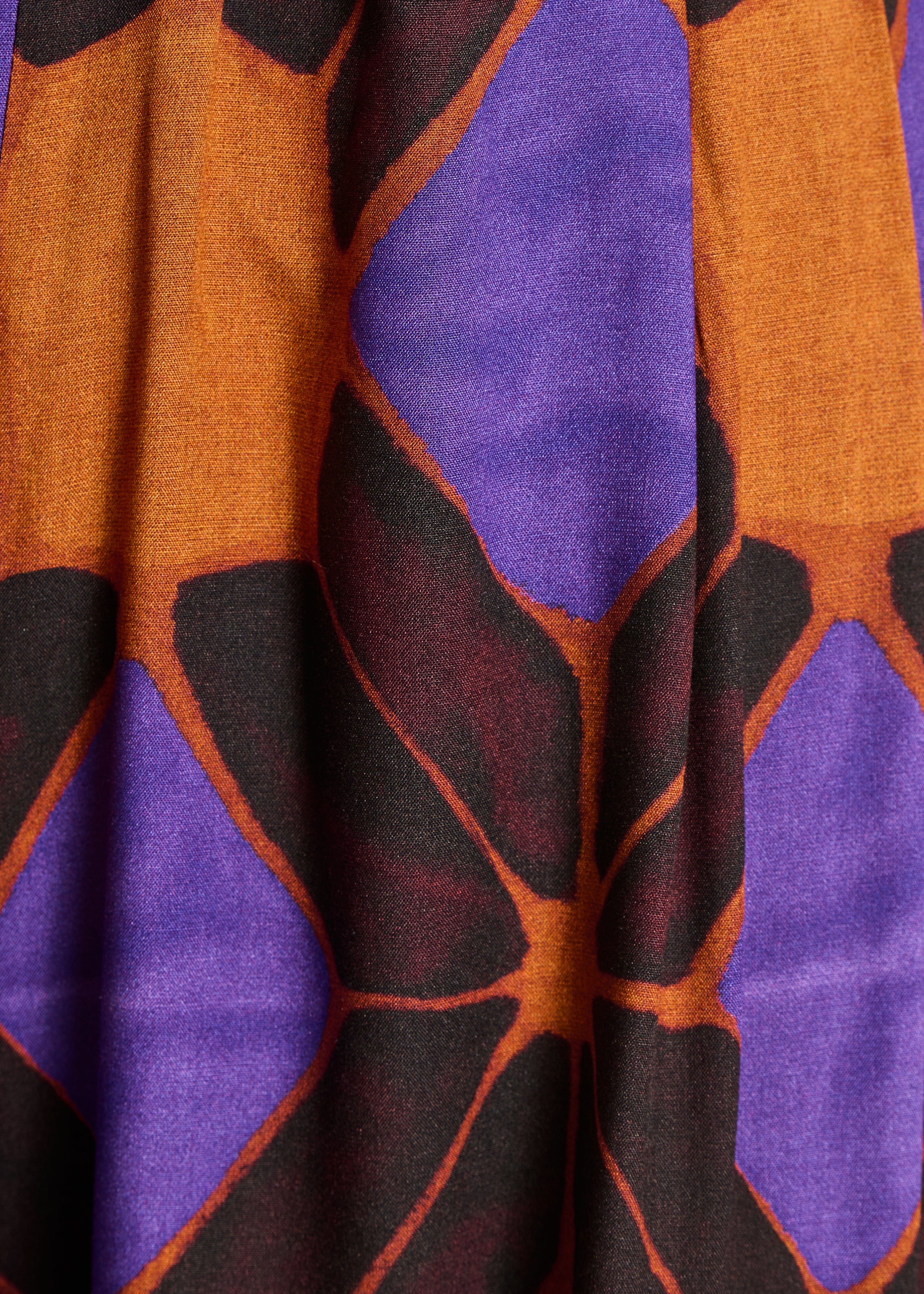 Pantalon large orange et violet à imprimé