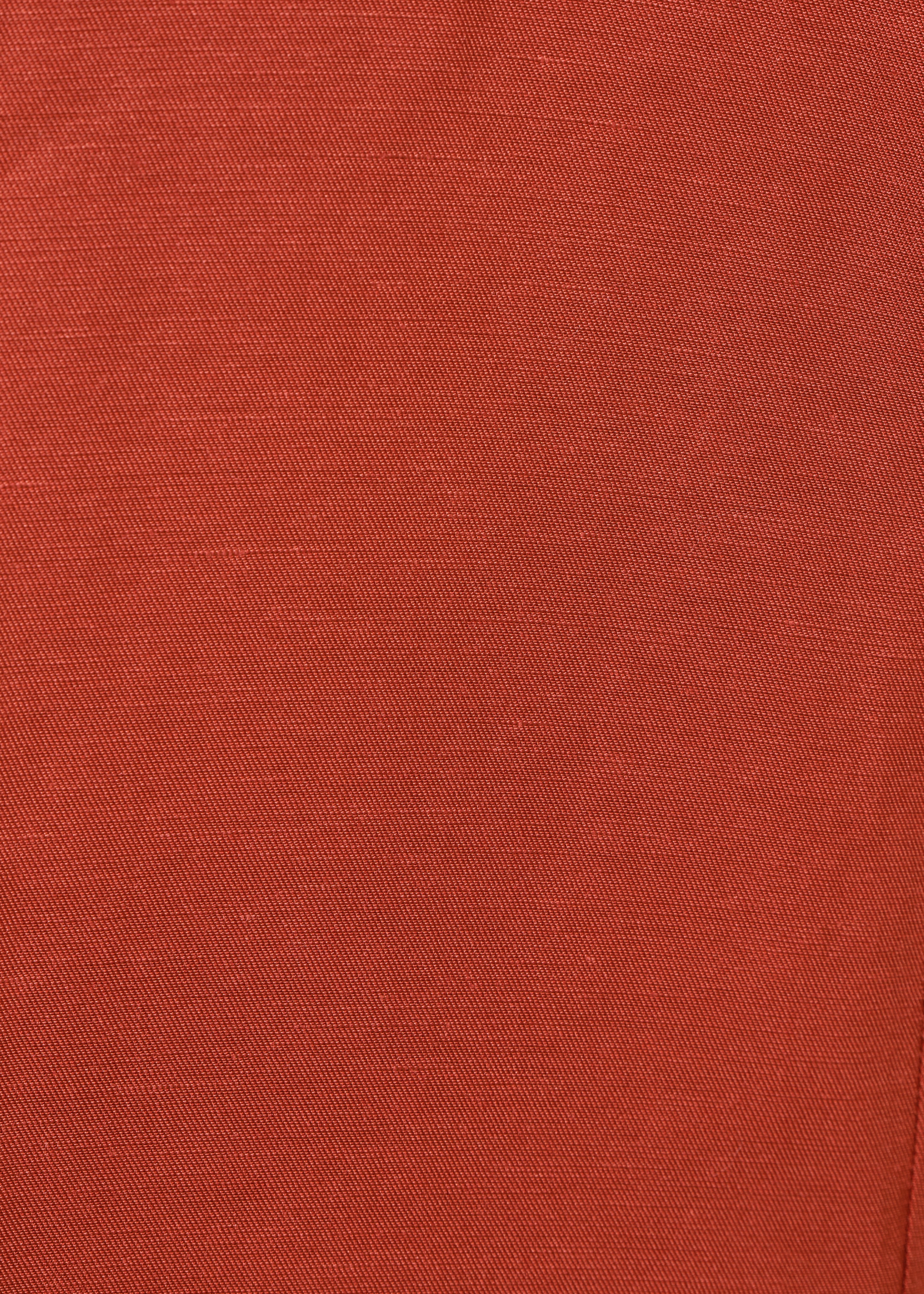 Hoch taillierte 7/8-Hose in Ziegelrot mit Schlitz