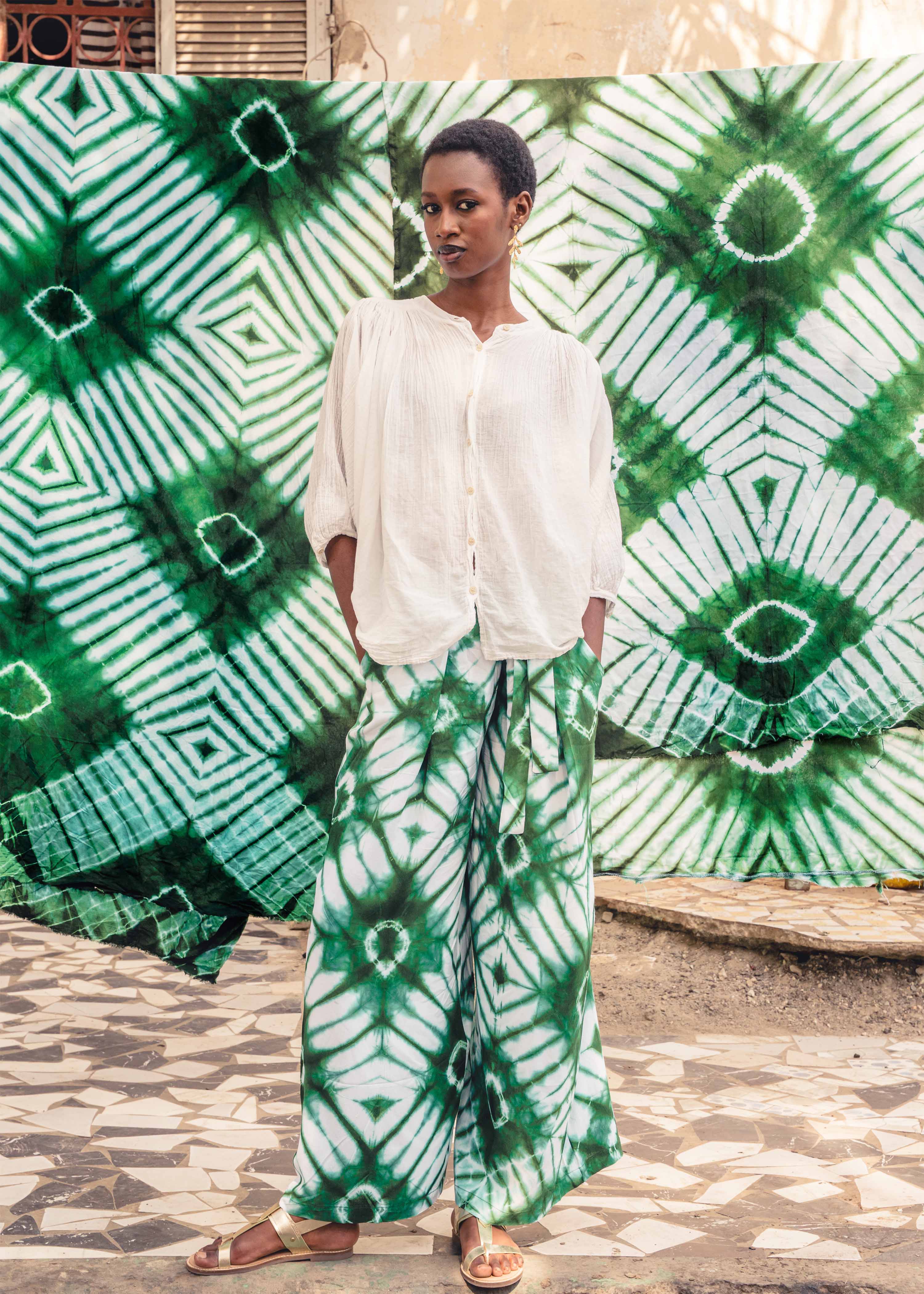 Wide green printed belted trousers